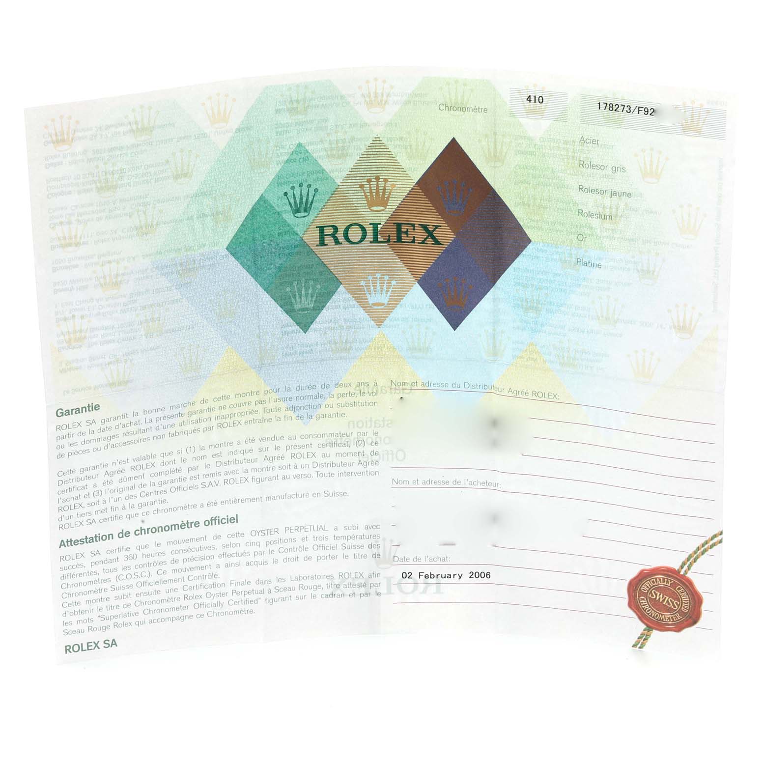 The image shows a warranty certificate for a Mid-Size Rolex watch, displaying text and the Rolex logo.