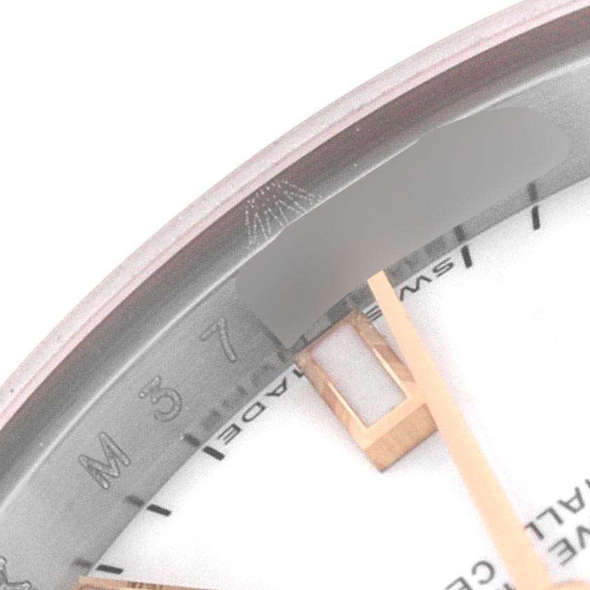 This image shows the partial face, hands, and inner bezel of a Rolex Datejust 179171 Women's Steel and Gold (two tone) White Dial 179171 Women's Steel and Gold (two tone) White Dial watch at a close-up angle.