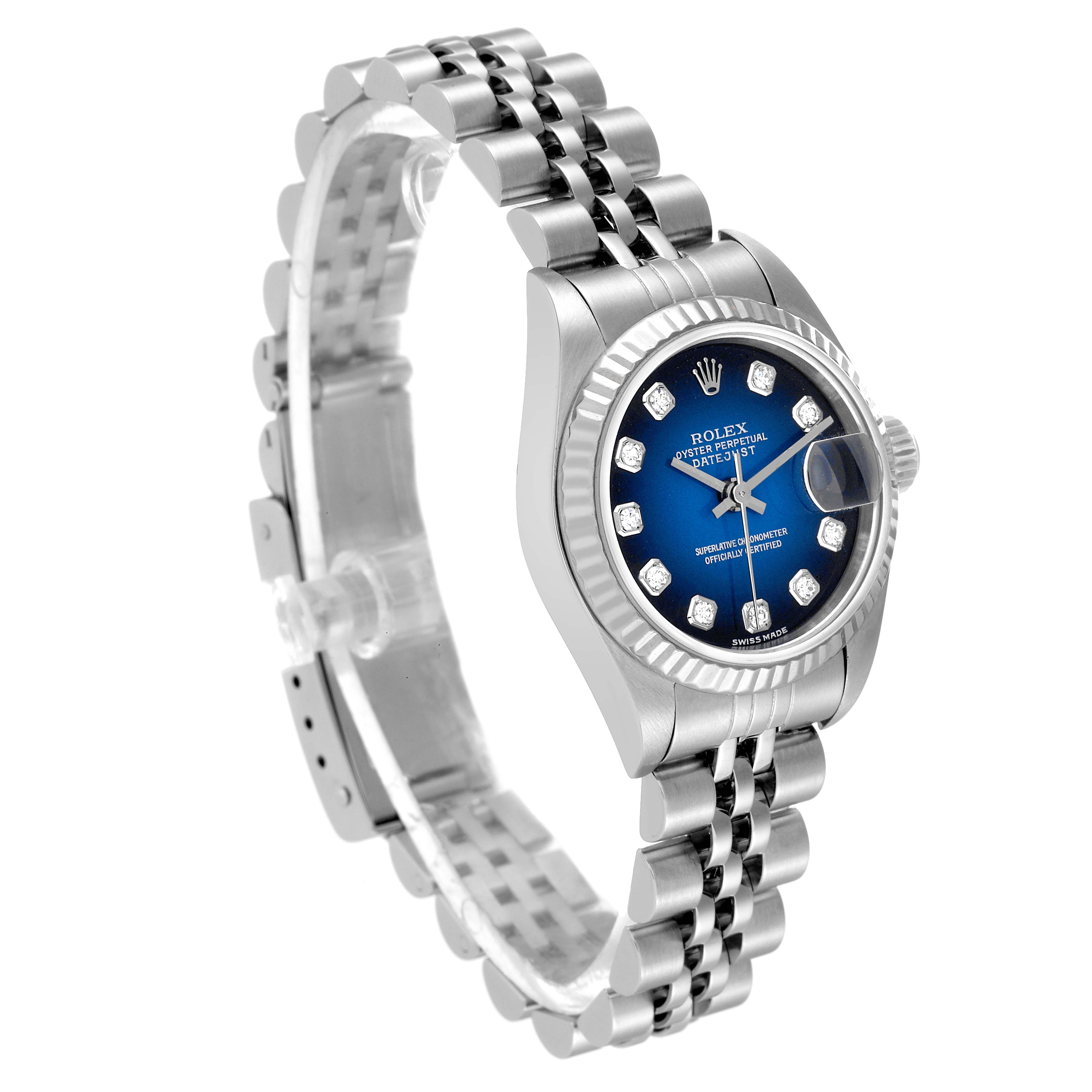 The Rolex Datejust 79174 Women's Stainless Steel Blue Dial 79174 Women's Stainless Steel Blue Dial watch is shown at an angled side view, displaying its dial, bezel, and part of the jubilee bracelet.