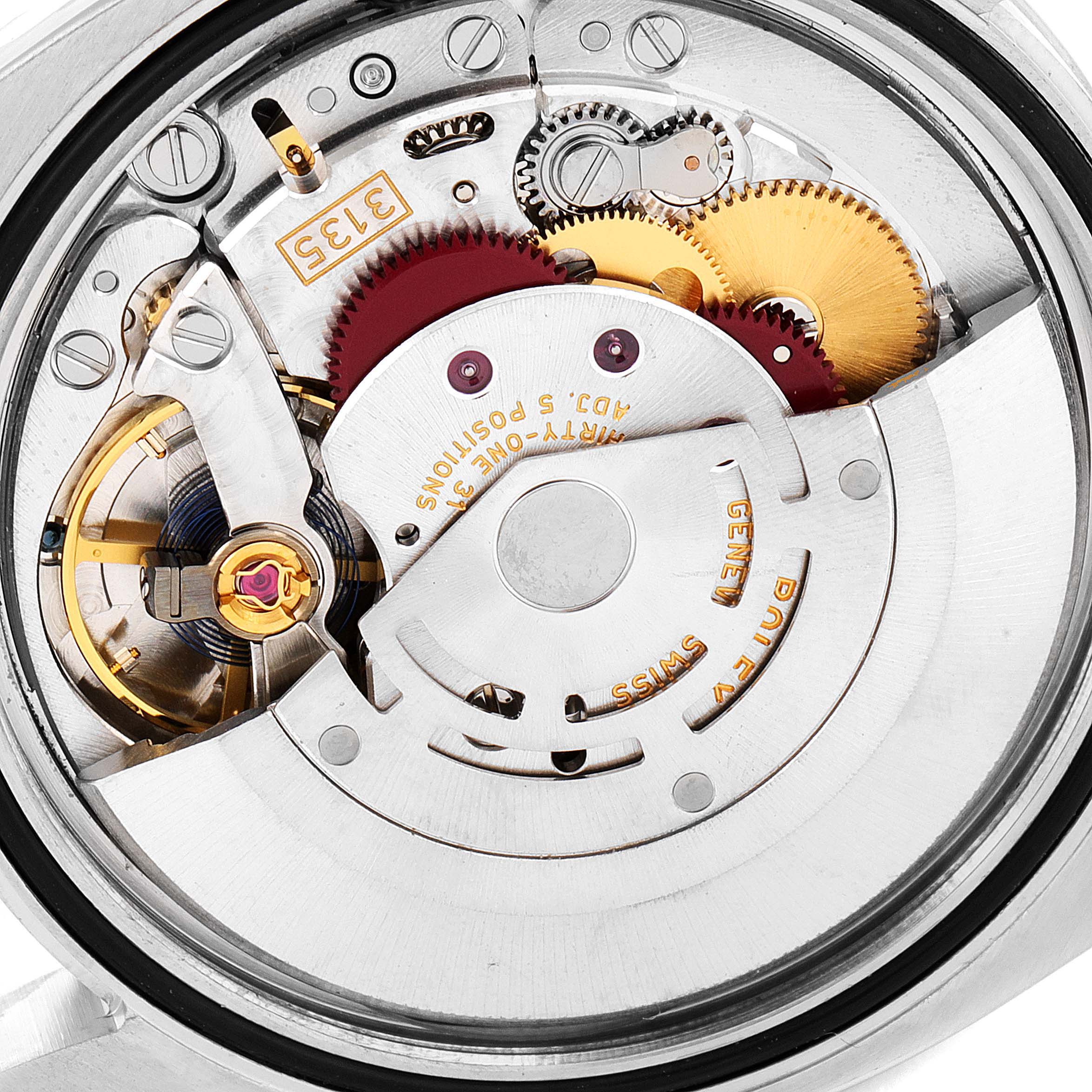 This image shows a close-up view of the internal movement parts of a Rolex Datejust 116234 Men's Stainless Steel White Dial 116234 Men's Stainless Steel White Dial watch.