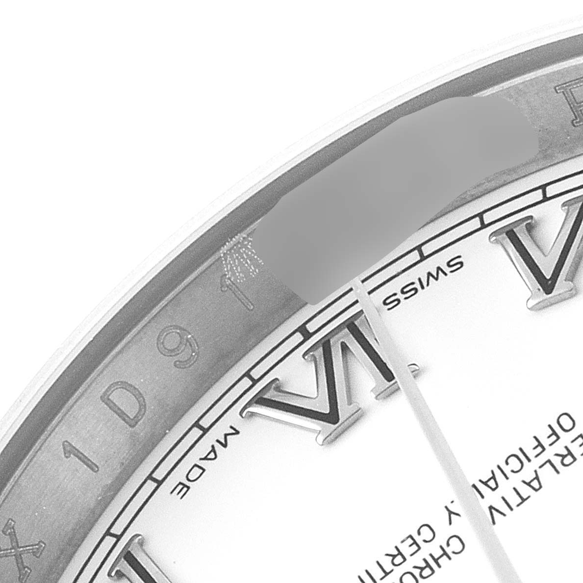 This close-up shows the dial and bezel of a Rolex Datejust 116234 Men's Stainless Steel White Dial 116234 Men's Stainless Steel White Dial watch, focusing on the Roman numerals and part of the date indicator.