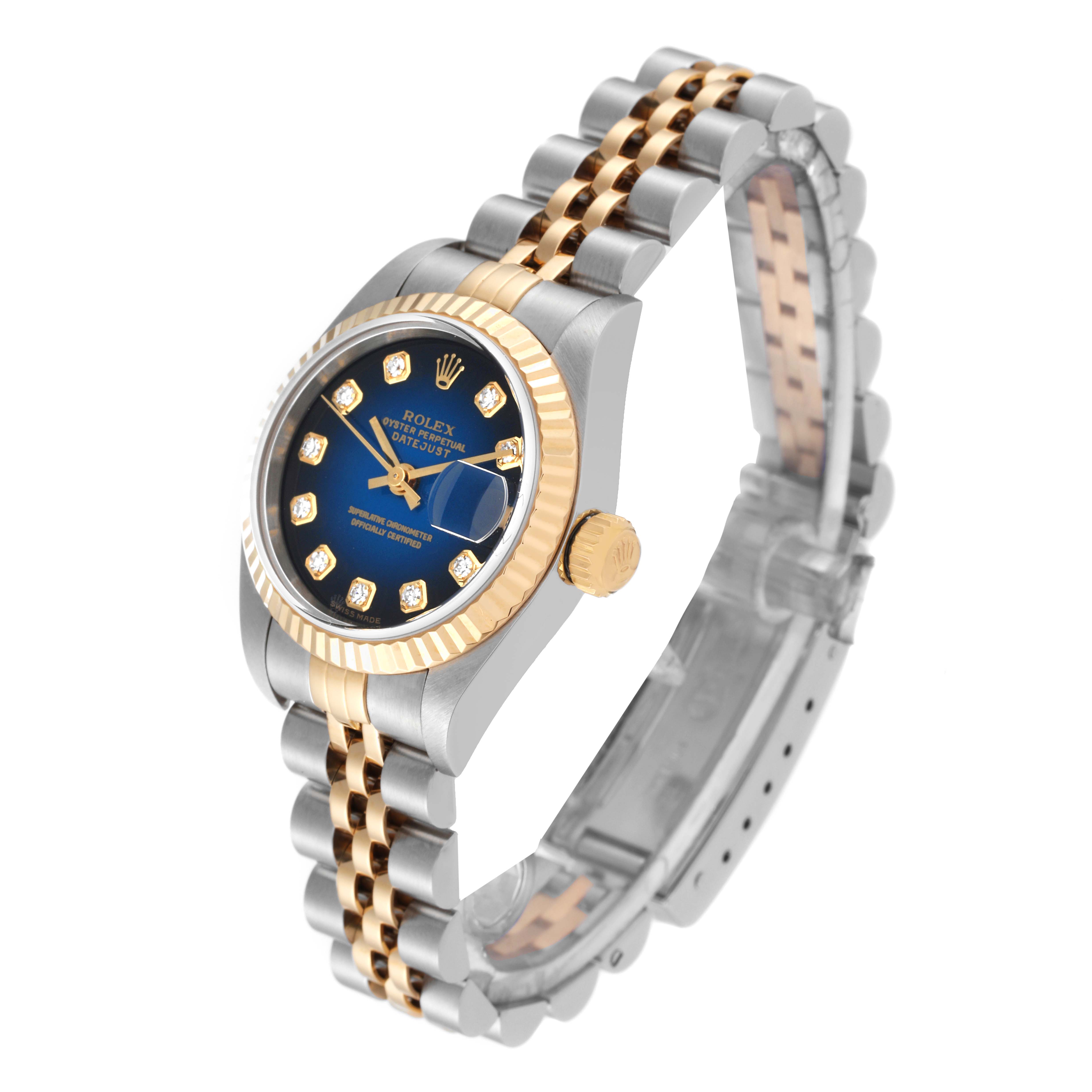 The image shows a Rolex Datejust 79173 Women's Steel and Gold (two tone) Blue Dial 79173 Women's Steel and Gold (two tone) Blue Dial watch from an angled view, highlighting the face, dial, bezel, crown, and dual-tone bracelet.