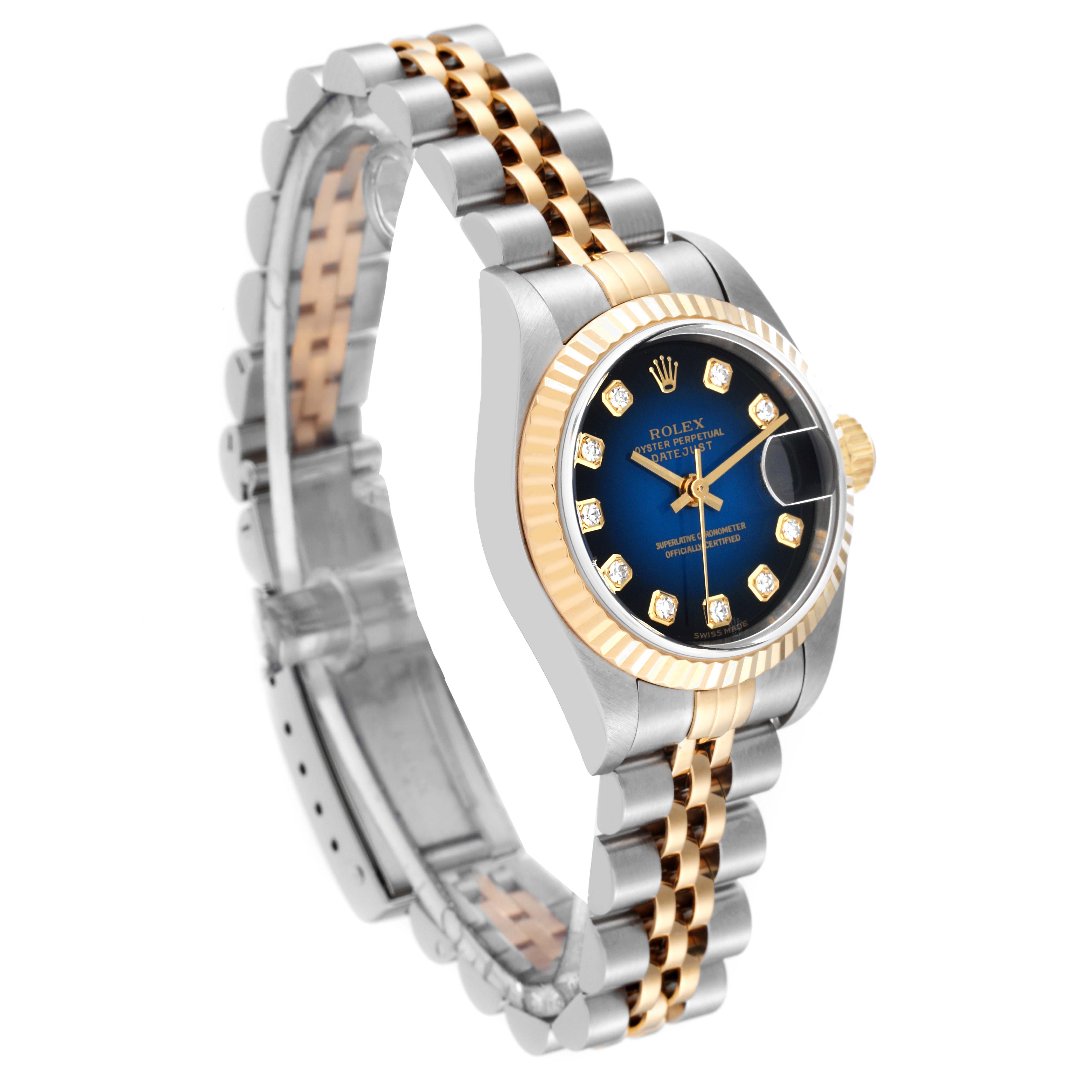The image shows a Rolex Datejust 79173 Women's Steel and Gold (two tone) Blue Dial 79173 Women's Steel and Gold (two tone) Blue Dial watch at an angled side view, highlighting its dial, bezel, crown, and bracelet.