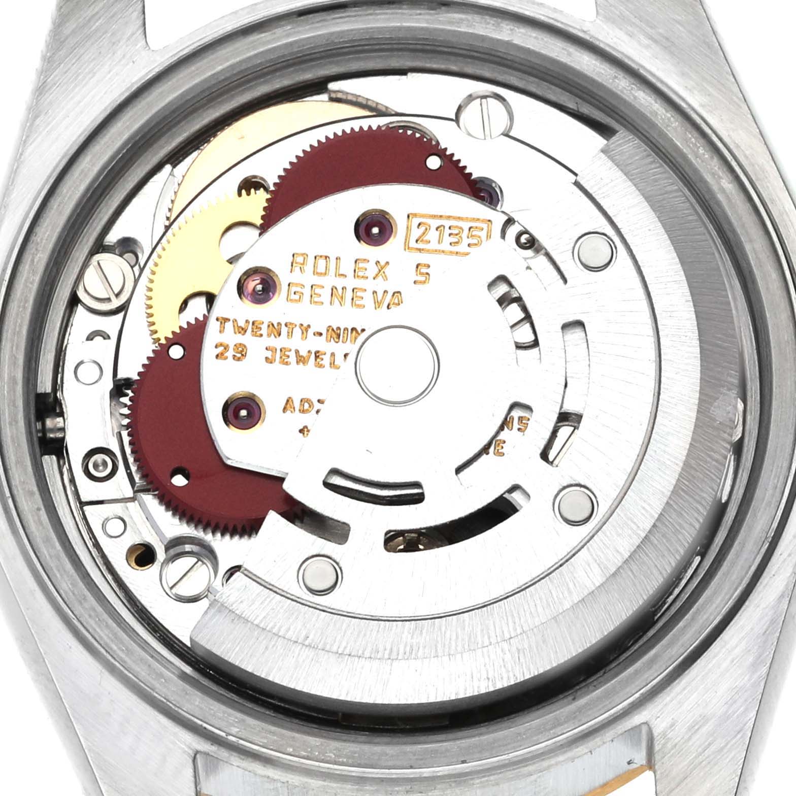 The image shows the movement of a Rolex Datejust 69173 Women's Steel and Gold (two tone) Champagne Dial 69173 Women's Steel and Gold (two tone) Champagne Dial watch from a top view, highlighting gears and the rotor.