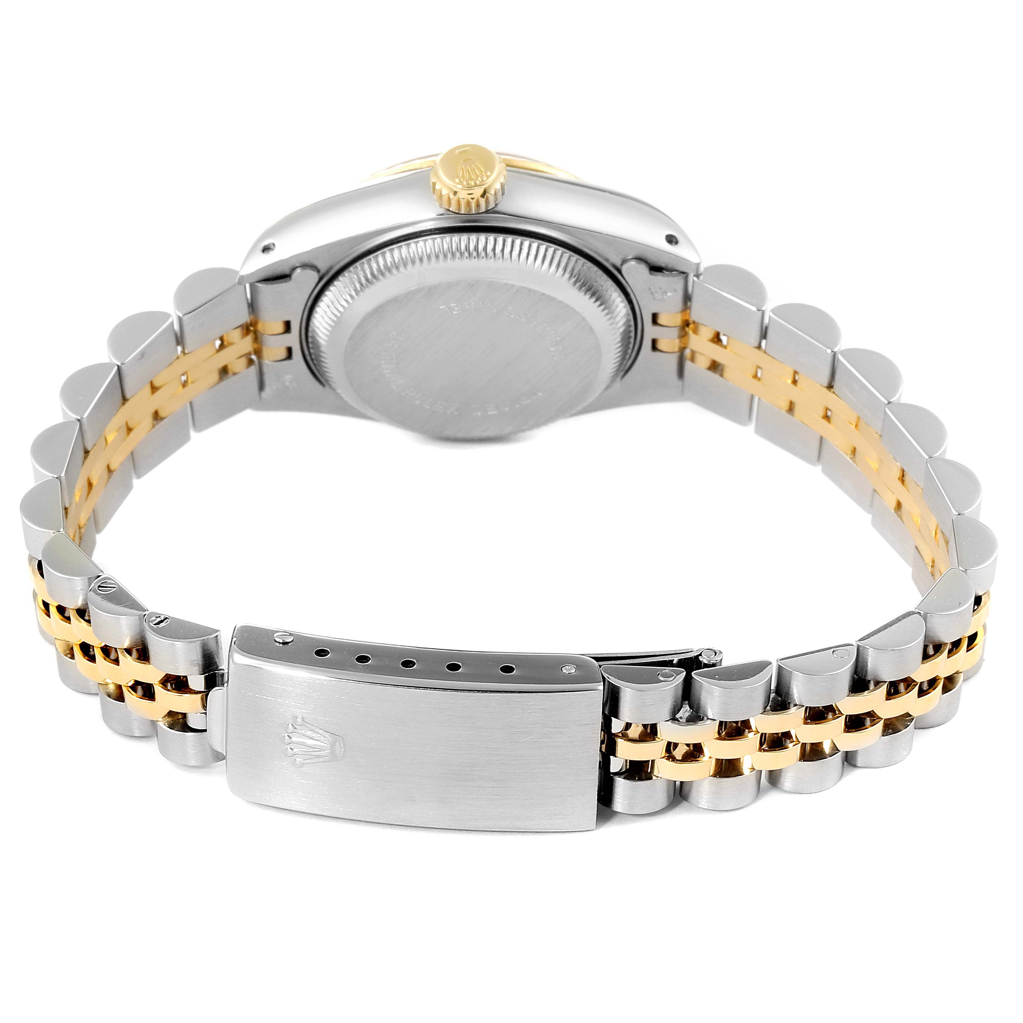 The image shows the Rolex Datejust 69173 Women's Steel and Gold (two tone) Champagne Dial 69173 Women's Steel and Gold (two tone) Champagne Dial watch from the rear angle, highlighting the crown, case back, and two-tone bracelet with clasp.