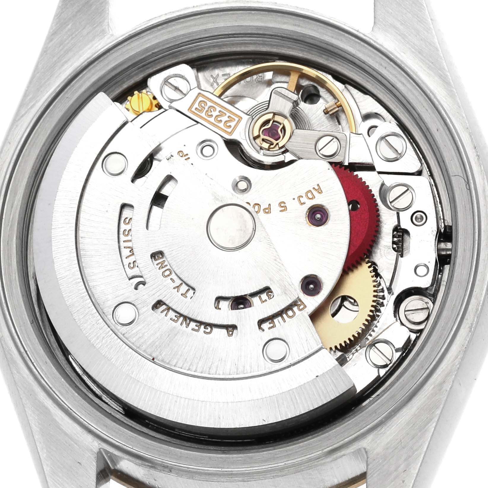 The image shows the movement mechanism of a Rolex Datejust 79173 Women's Steel and Gold (two tone) Silver Dial 79173 Women's Steel and Gold (two tone) Silver Dial watch from a rear angle, highlighting gears and parts.