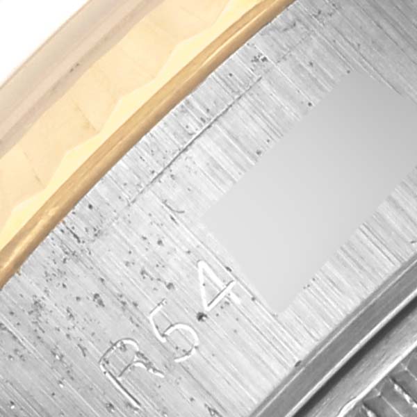 The image shows a close-up of the inner side of the bezel and the rehaut of a Rolex Datejust 69173 Women's Steel and Gold (two tone) White Dial 69173 Women's Steel and Gold (two tone) White Dial watch.