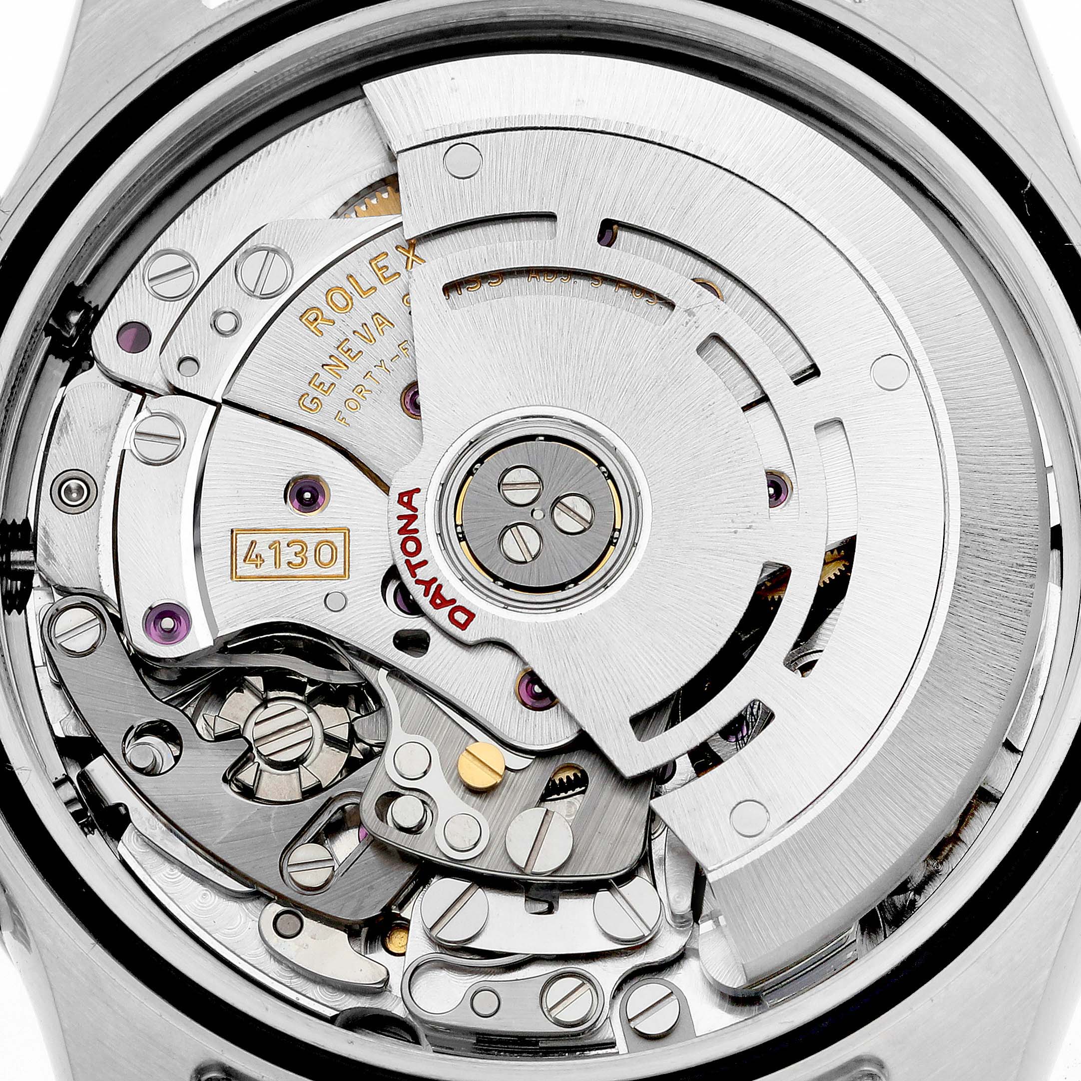 The image shows the intricate movement of a Rolex Daytona 116520 Men's Stainless Steel White Dial 116520 Men's Stainless Steel White Dial watch, highlighting gears and the rotor with "Daytona" branding.