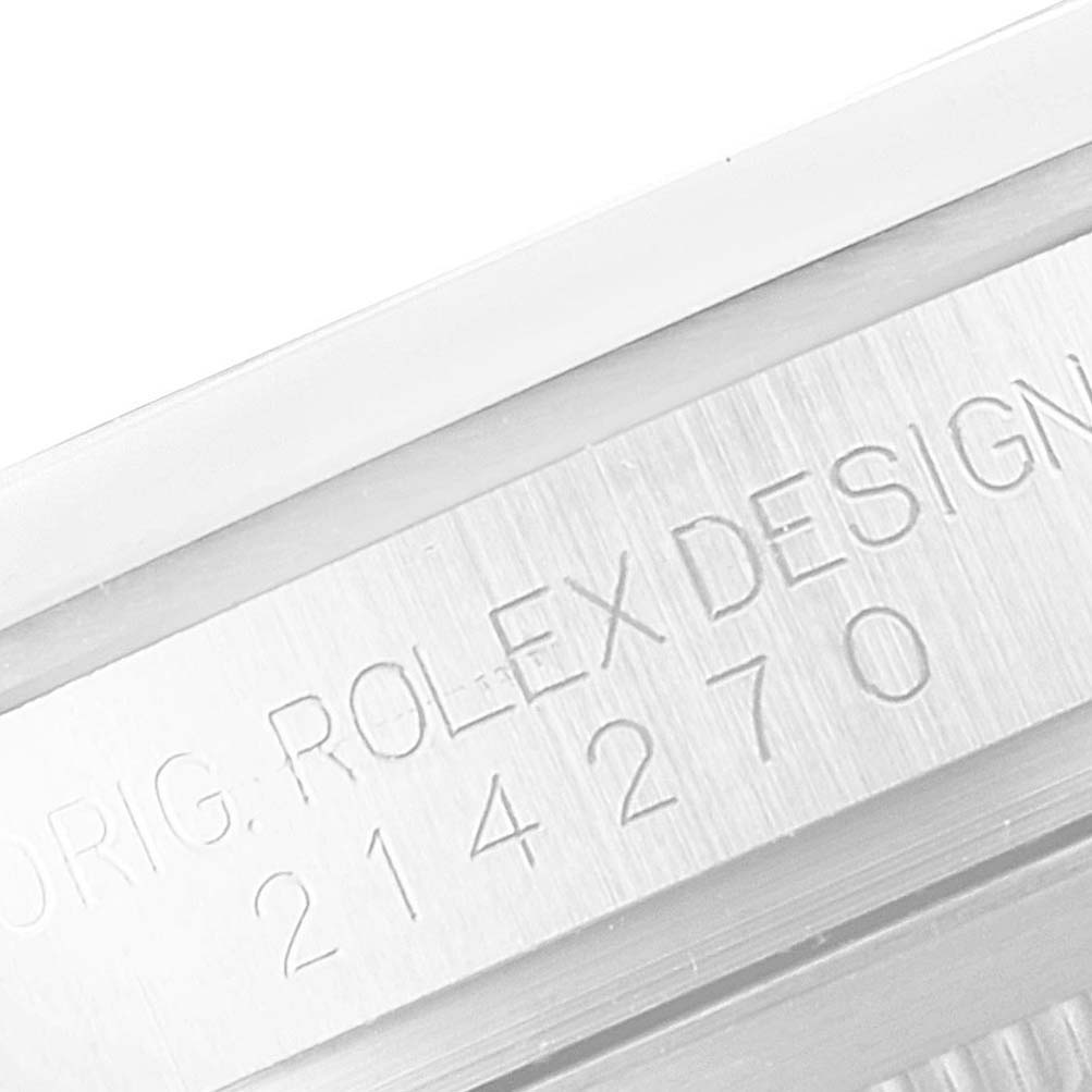 This image shows an angled close-up of the serial number engraving on the casing of a Rolex Explorer 214270 Men
s Stainless Steel Black Dial 214270 Men
s Stainless Steel Black Dial watch.