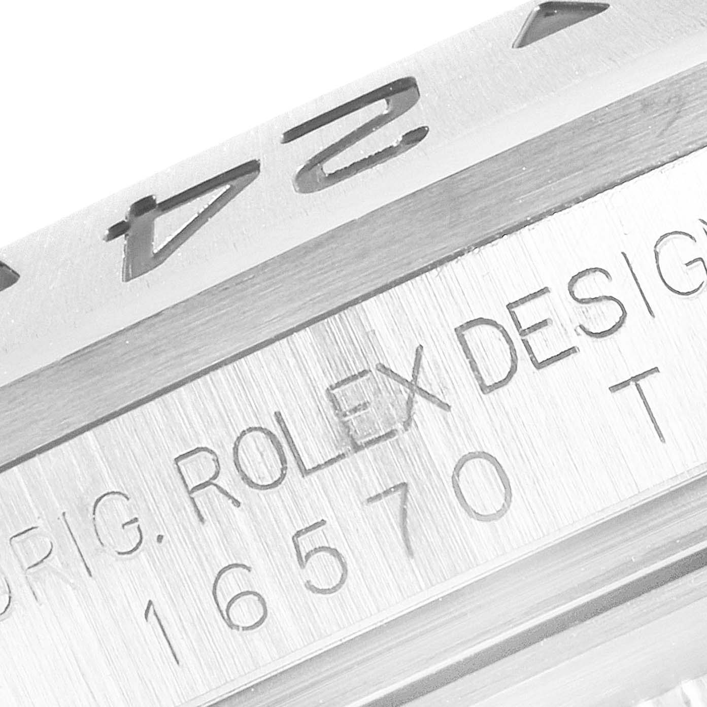 The image displays a close-up of the side of the Rolex Explorer 16570 Men
s Stainless Steel Black Dial 16570 Men
s Stainless Steel Black Dial watch, showcasing its model number (16570) and branding engravings.