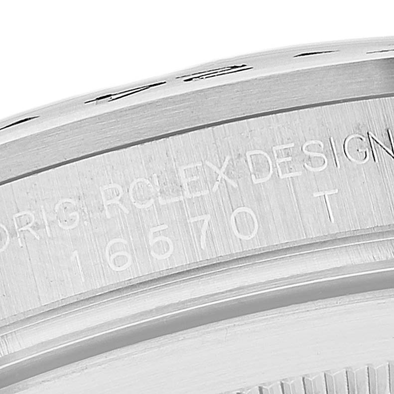 This image shows a close-up of the engraved details on the bezel of the Rolex Explorer 16570 Men's Stainless Steel Black Dial 16570 Men's Stainless Steel Black Dial model watch.