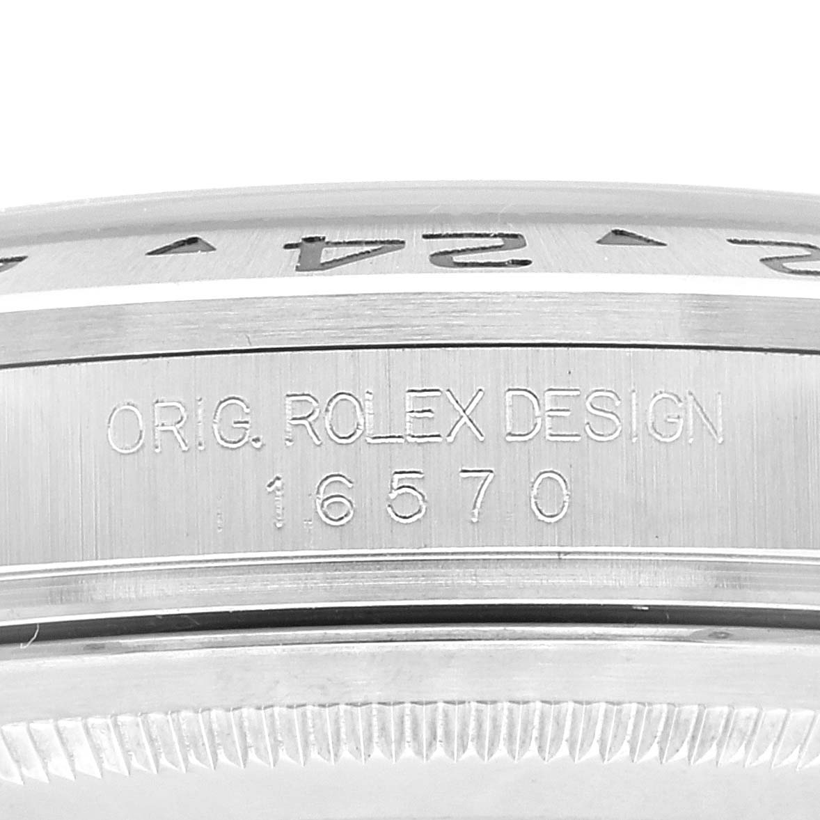 This image shows a close-up view of the side engraving on the case of a Rolex Explorer 16570 Men
s Stainless Steel Black Dial 16570 Men
s Stainless Steel Black Dial model, displaying "ORIG. ROLEX DESIGN 16570."
