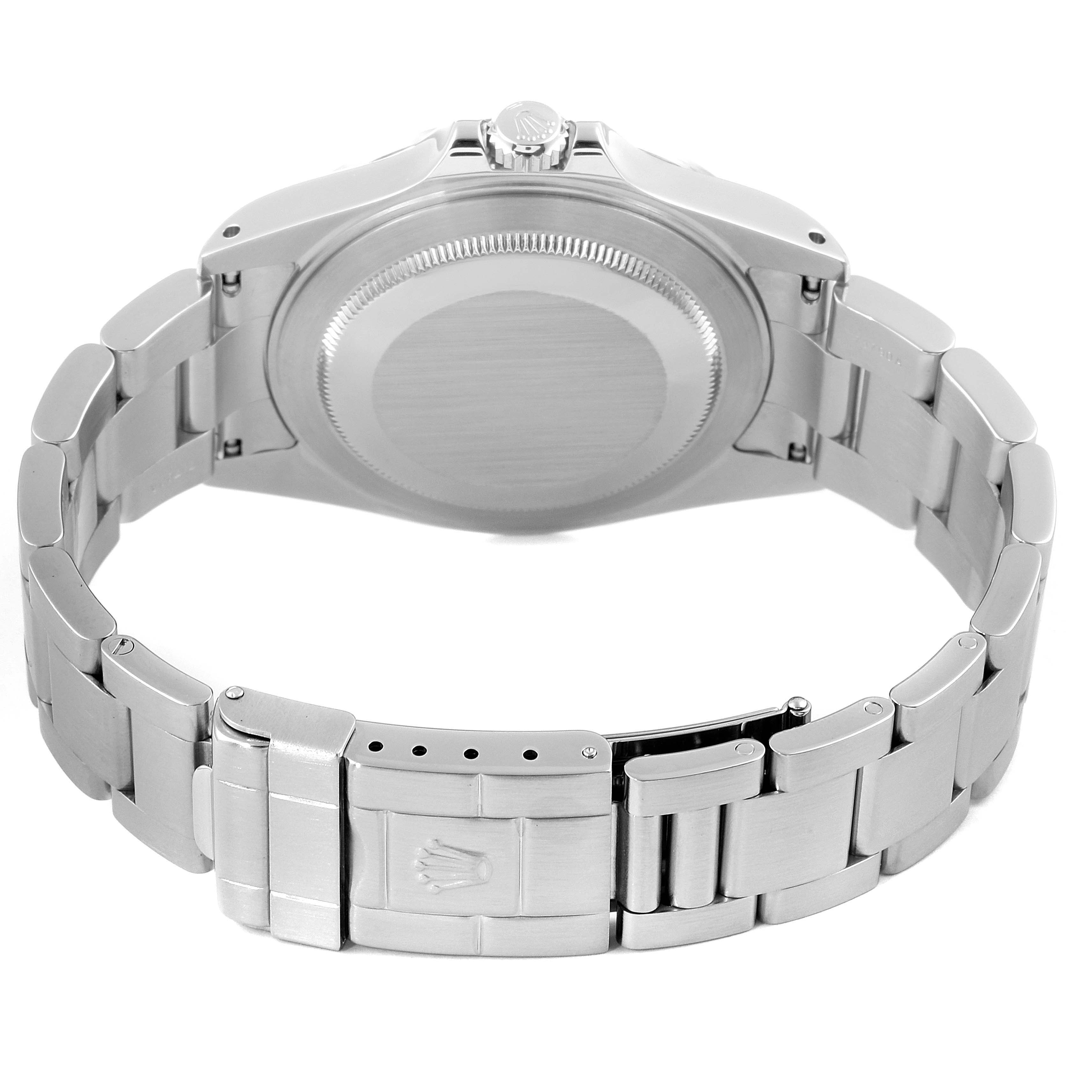 The image shows the back view of a Rolex Explorer 16570 Men
s Stainless Steel White Dial 16570 Men
s Stainless Steel White Dial watch, highlighting the case back and the metal bracelet with a clasp.