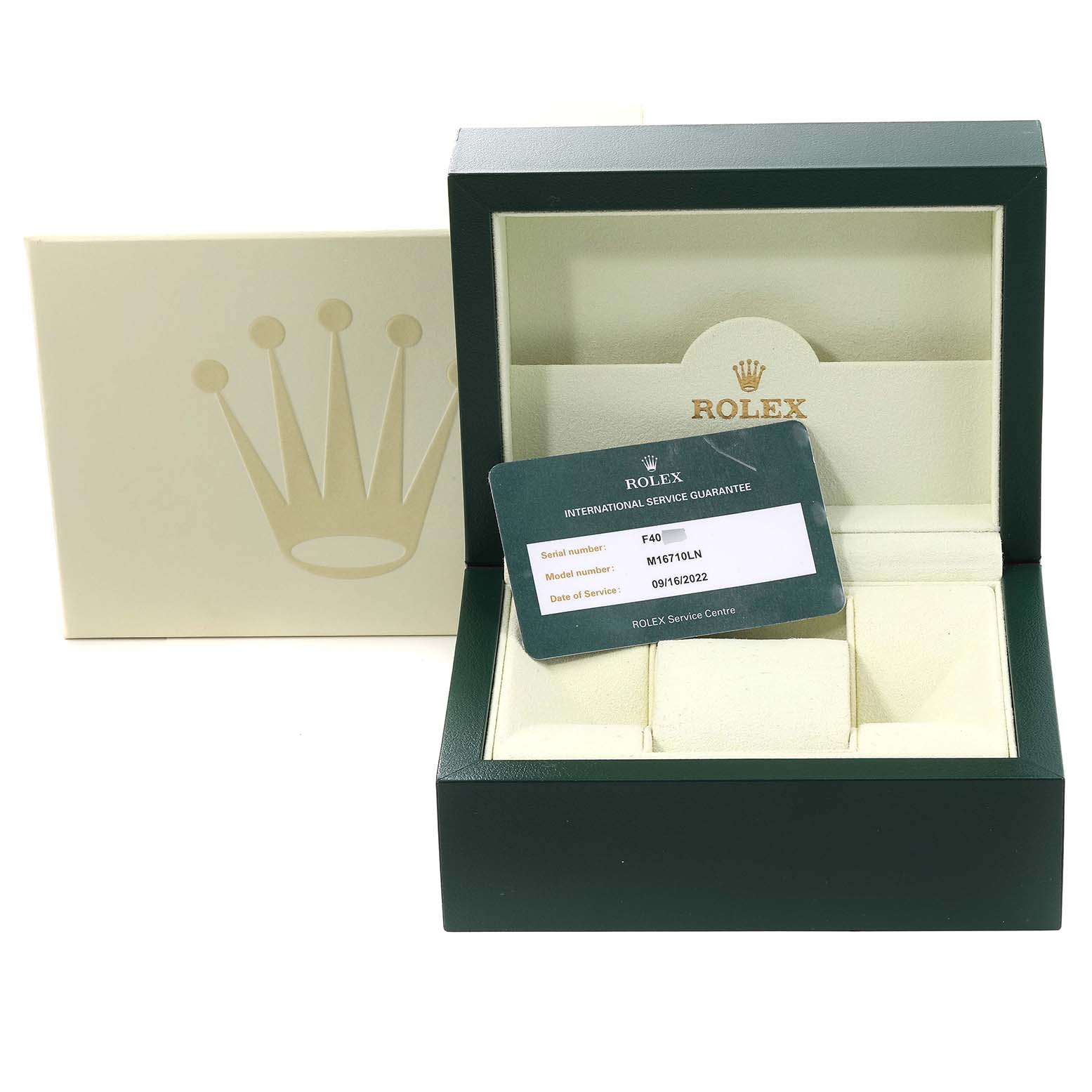 The image shows an open Rolex watch box for a GMT-Master model, along with an international service guarantee card.