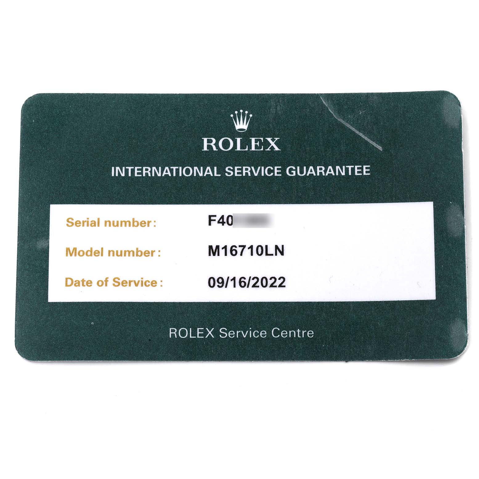 The image shows a Rolex International Service Guarantee card for the GMT-Master model M16710LN.