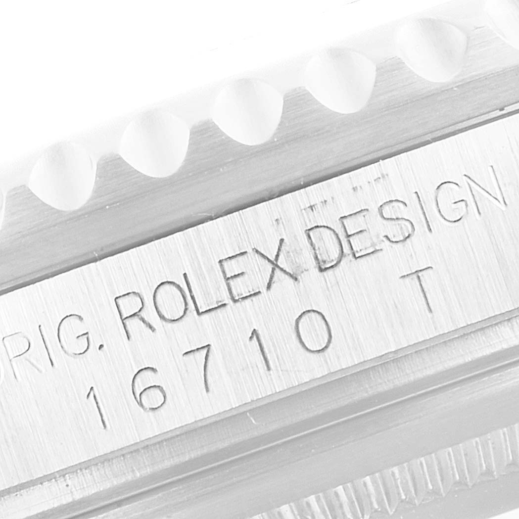 This image shows a close-up of the side engraving on the case of a Rolex GMT-Master 16710 Men
s Stainless Steel Black Dial 16710 Men
s Stainless Steel Black Dial watch.