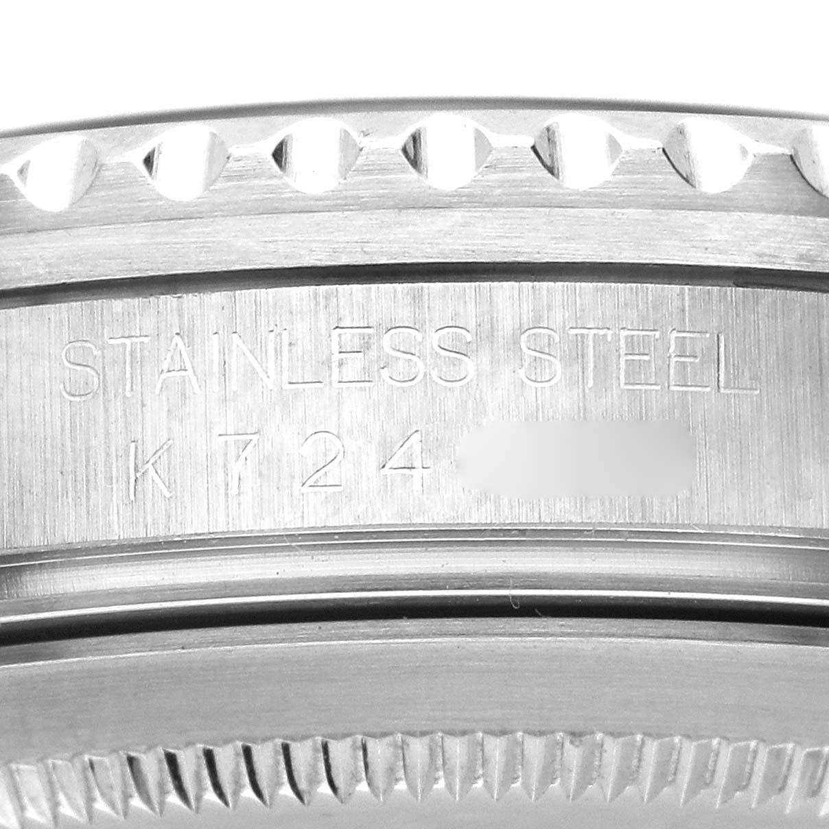 The image shows a close-up of the casing side of a Rolex GMT-Master 16710 Men's Stainless Steel Black Dial 16710 Men's Stainless Steel Black Dial, highlighting the stainless steel material.