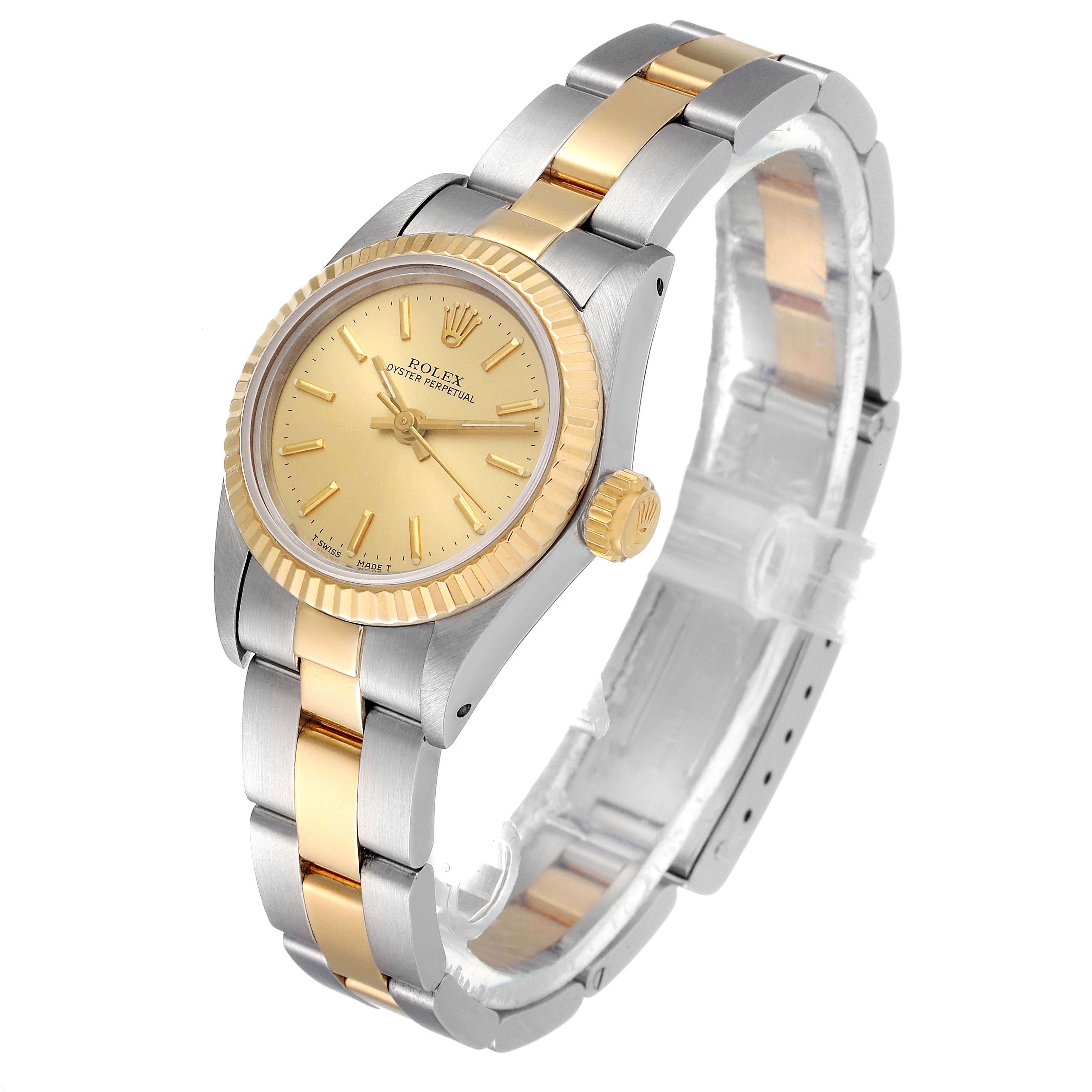 This image shows a Rolex Oyster Perpetual 67193 Women
s Steel and Gold (two tone) Champagne Dial 67193 Women
s Steel and Gold (two tone) Champagne Dial watch from a side angle, highlighting its two-tone bracelet, bezel, and crown.