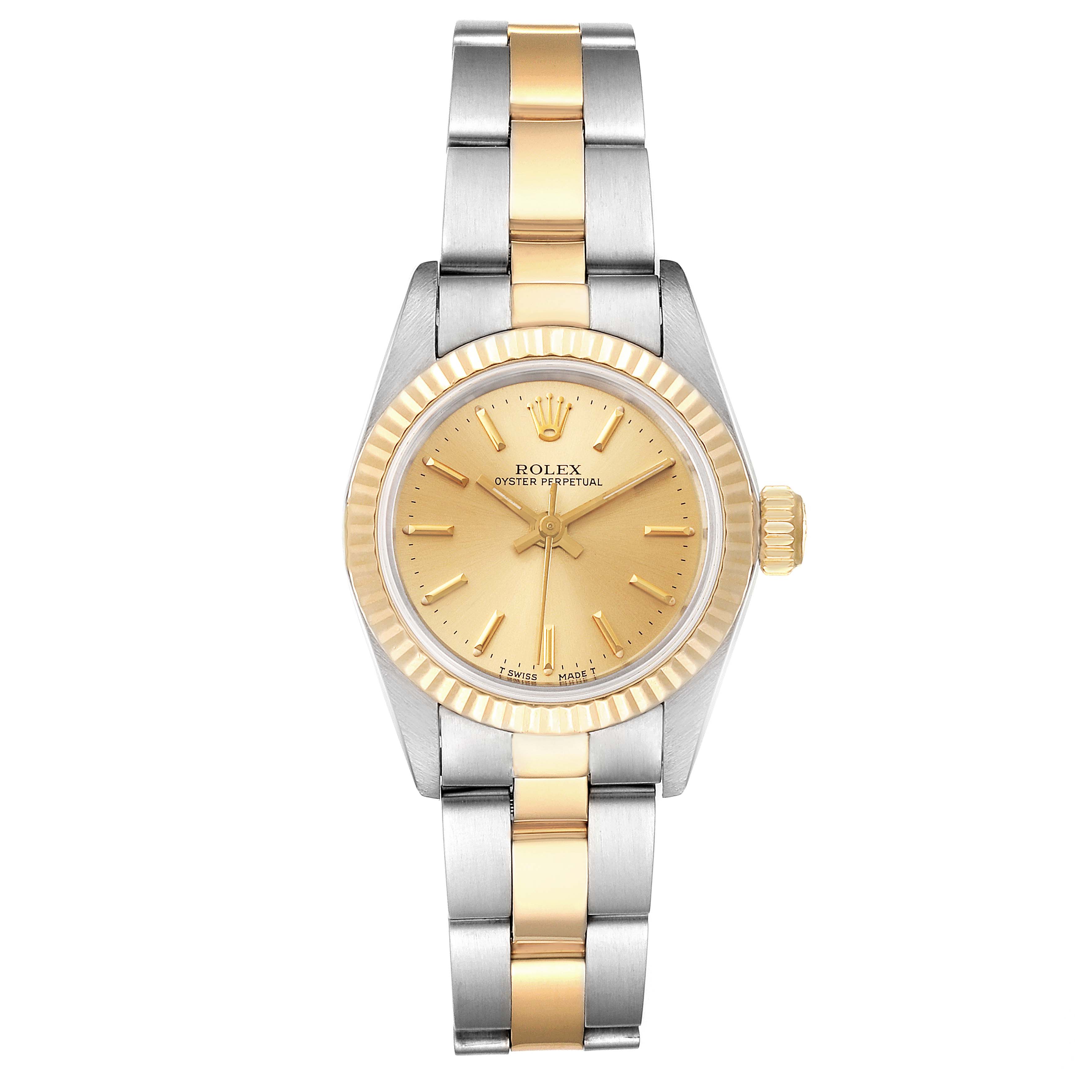 This image shows a front view of the Rolex Oyster Perpetual 67193 Women
s Steel and Gold (two tone) Champagne Dial 67193 Women
s Steel and Gold (two tone) Champagne Dial watch with a gold and silver bracelet.