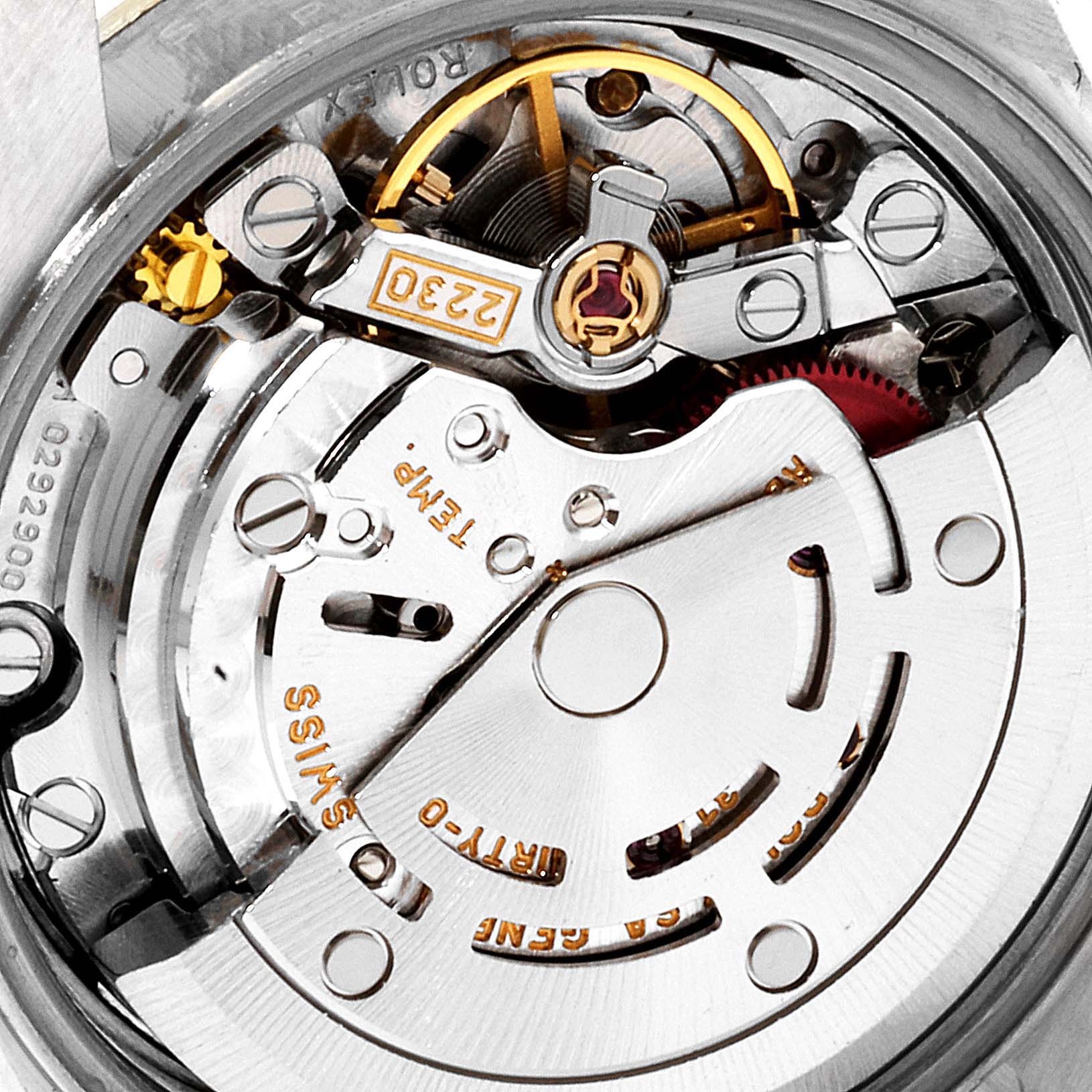 This close-up image shows the intricate internal mechanics and movement components of a Rolex Oyster Perpetual 76193 Women
s Steel and Gold (two tone) Champagne Dial 76193 Women
s Steel and Gold (two tone) Champagne Dial watch.