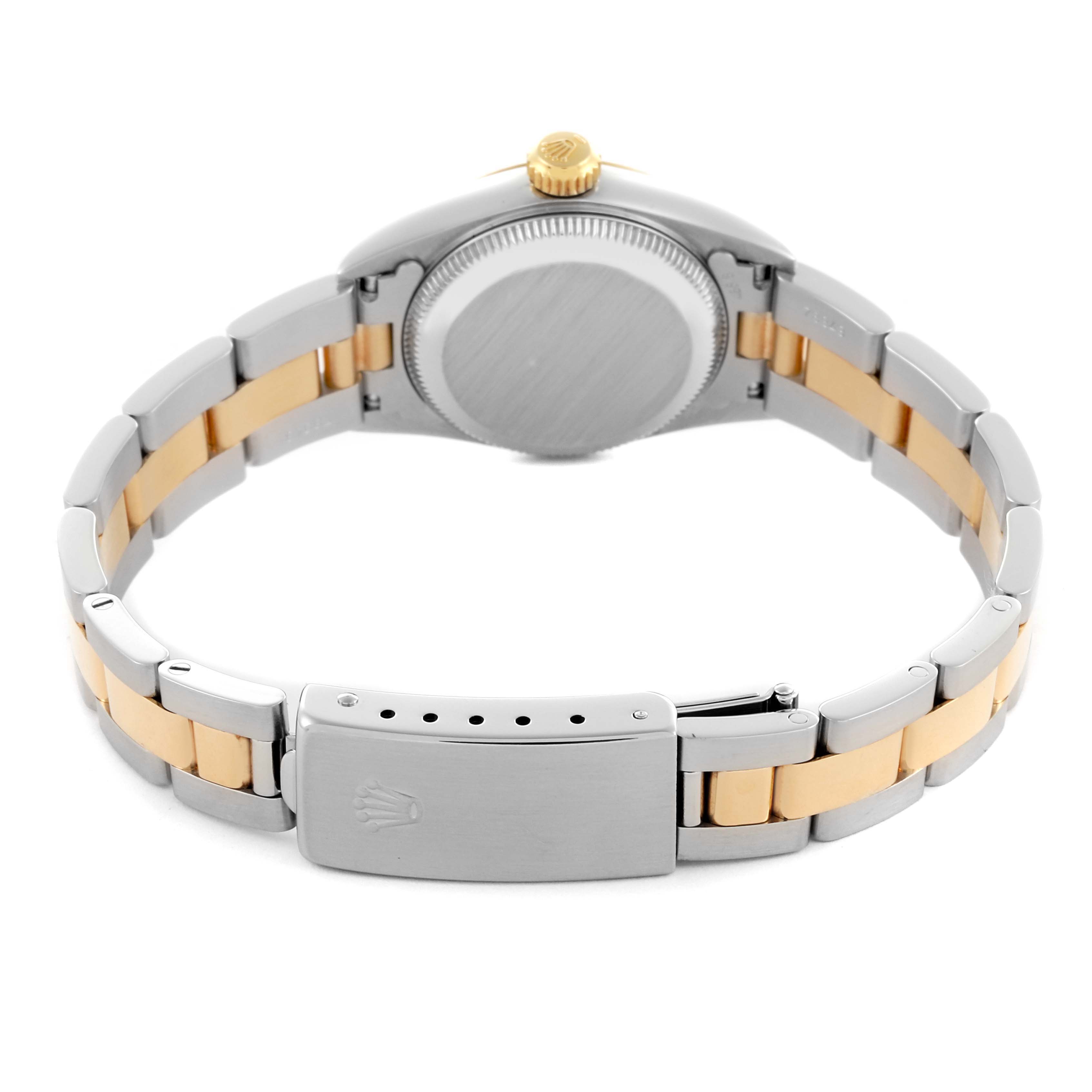 The Rolex Oyster Perpetual 67193 Women's Steel and Gold (two tone) Champagne Dial 67193 Women's Steel and Gold (two tone) Champagne Dial watch is shown from the back, highlighting the case back, bracelet, and clasp.