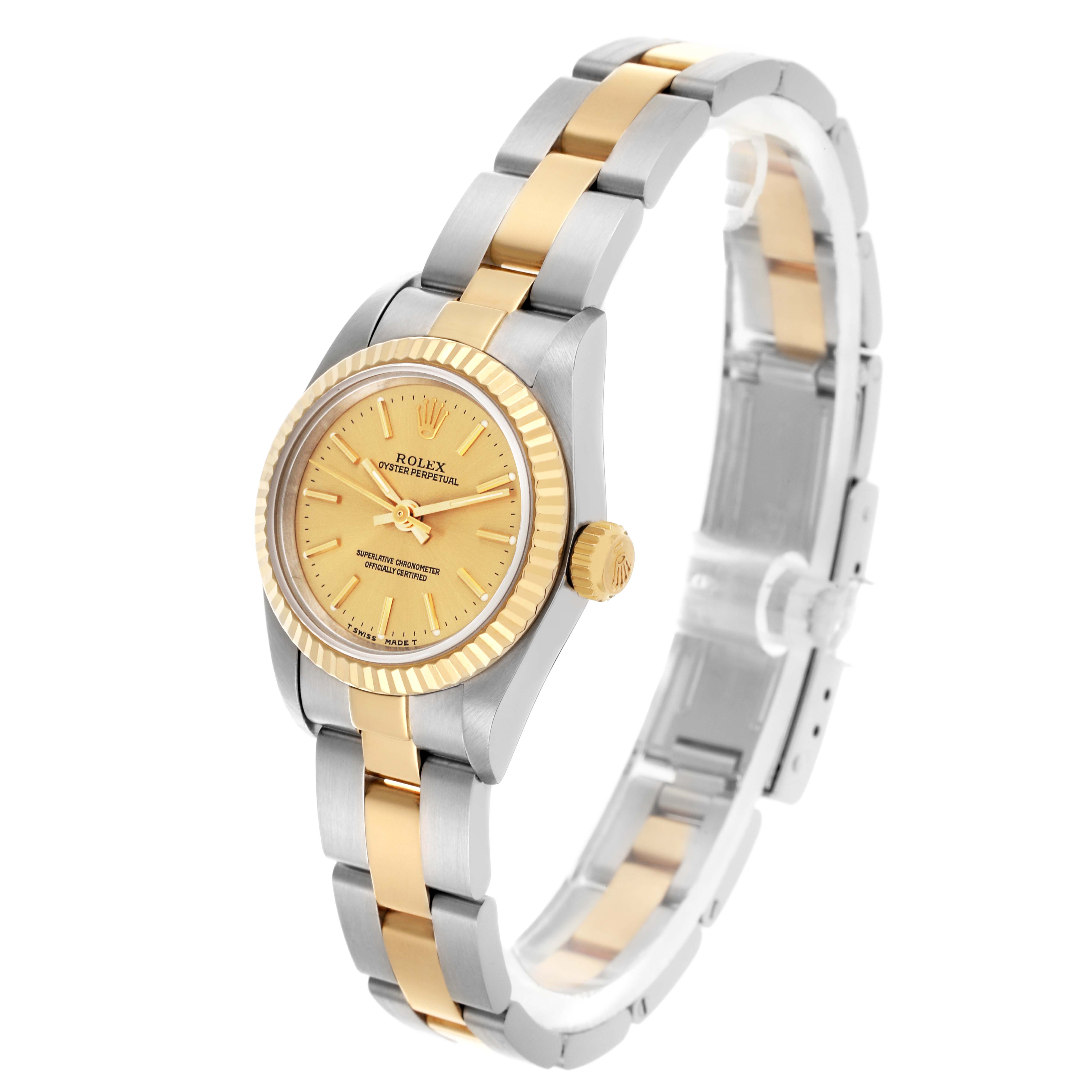 The Rolex Oyster Perpetual 67193 Women's Steel and Gold (two tone) Champagne Dial 67193 Women's Steel and Gold (two tone) Champagne Dial watch is shown at an angled view, highlighting the face, bezel, and two-tone bracelet.