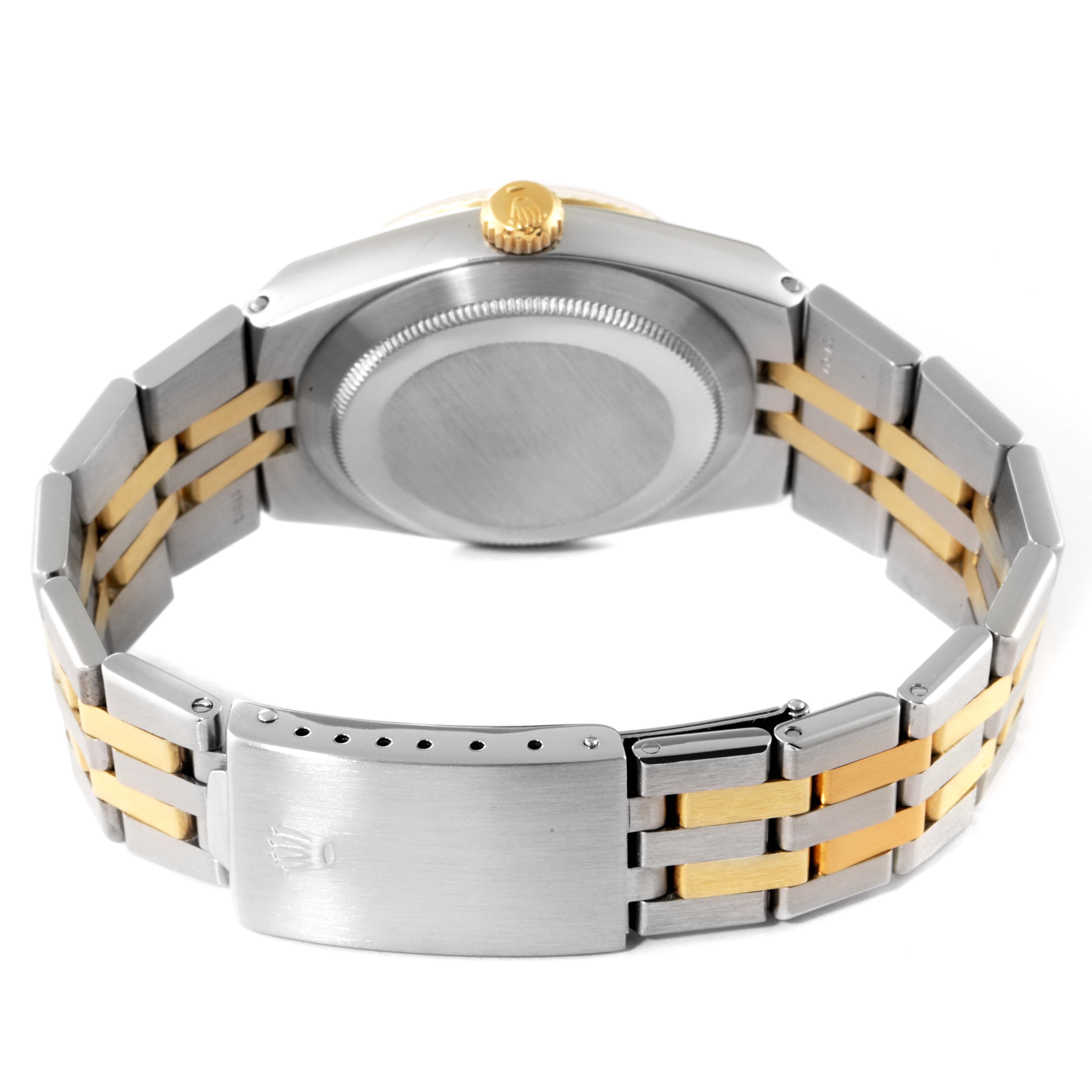 The image shows the back view of the Rolex Oysterquartz 17013 Men's Steel and Gold (two tone) White Dial 17013 Men's Steel and Gold (two tone) White Dial, highlighting the case back, bracelet, and clasp.