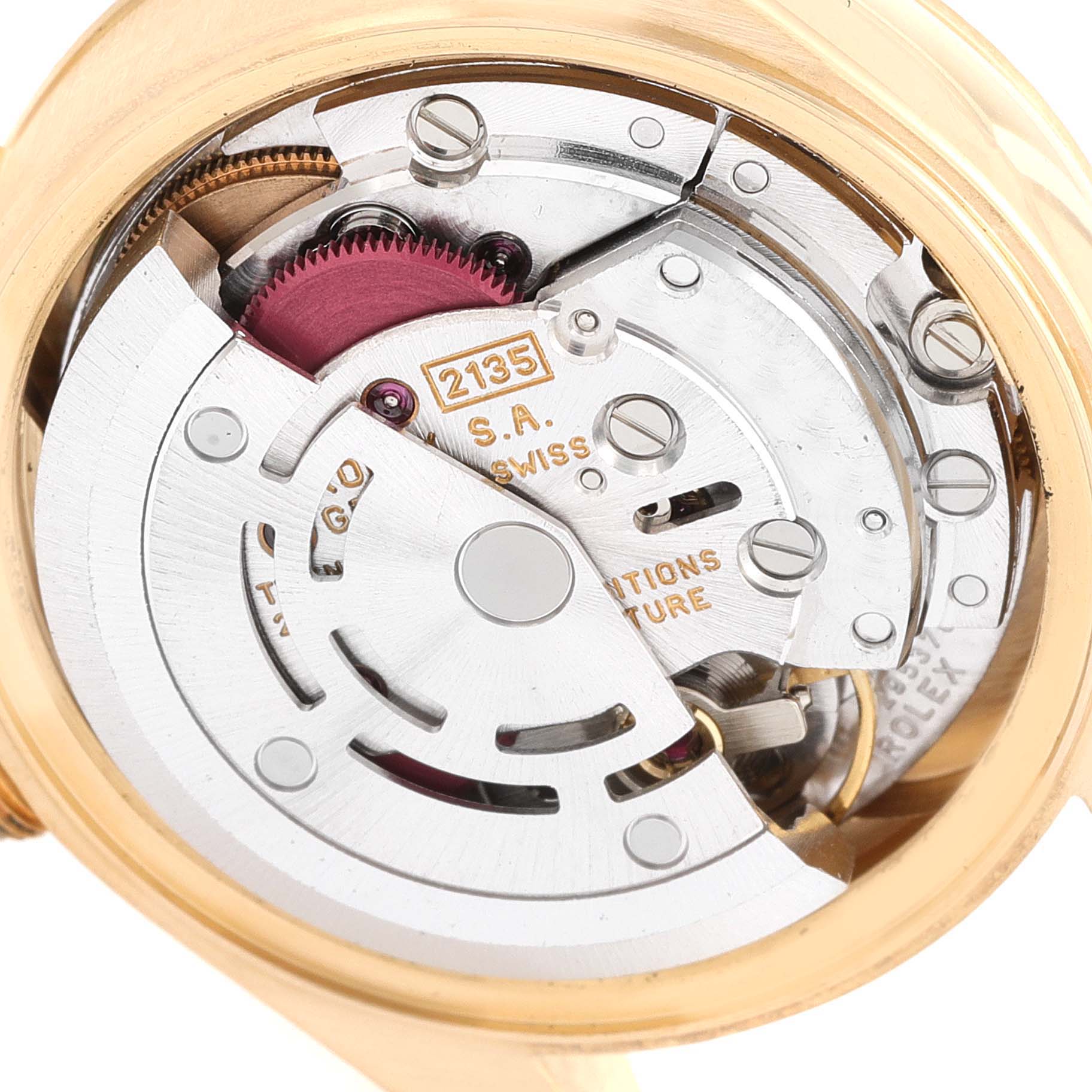The image shows a close-up of the internal movement of a Rolex President 69178 Women
s Yellow Gold Champagne Dial 69178 Women
s Yellow Gold Champagne Dial model watch.