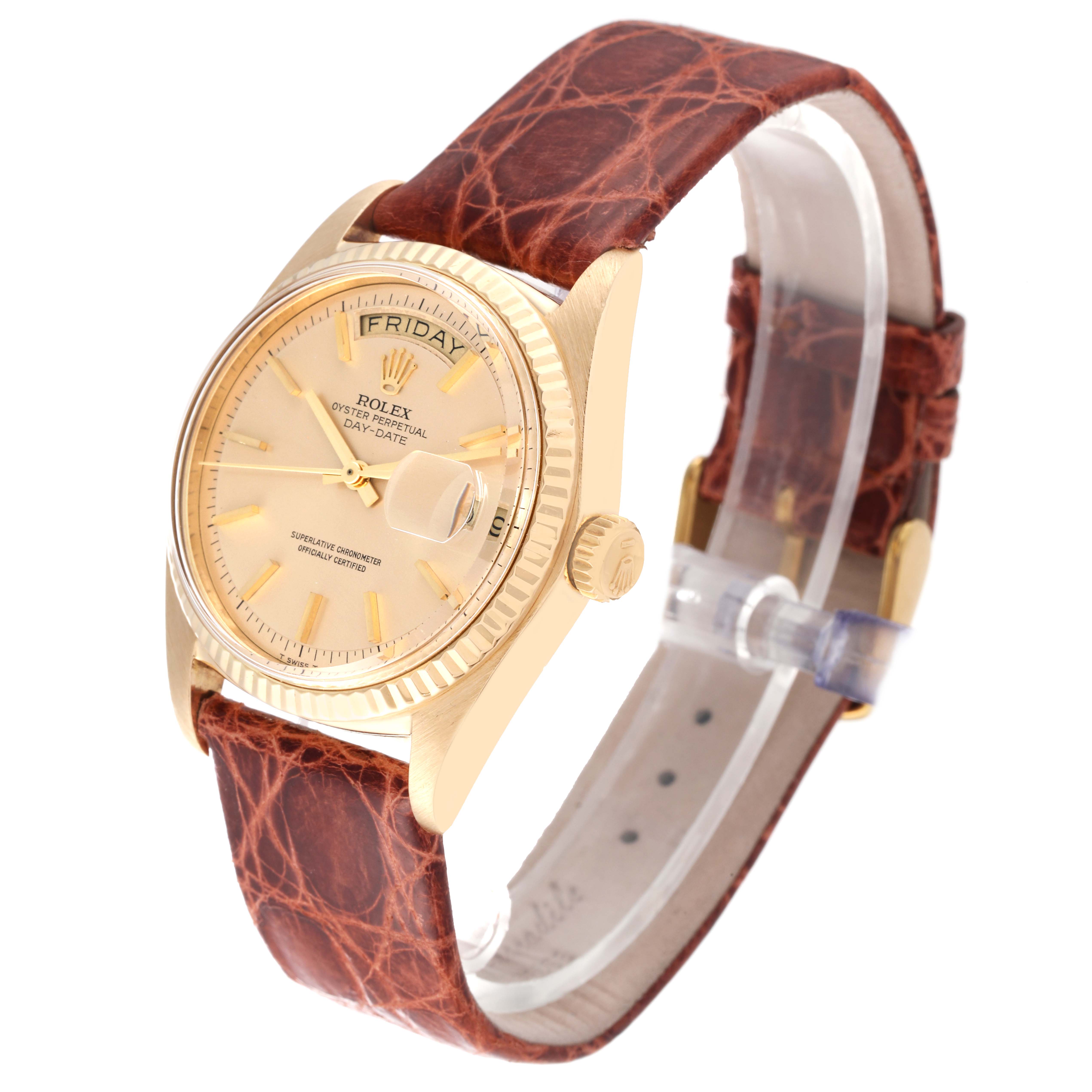 This image shows a Rolex President 1803 Men
s Yellow Gold Champagne Dial 1803 Men
s Yellow Gold Champagne Dial model watch angled to display the dial, day-date feature, crown, and brown leather strap.