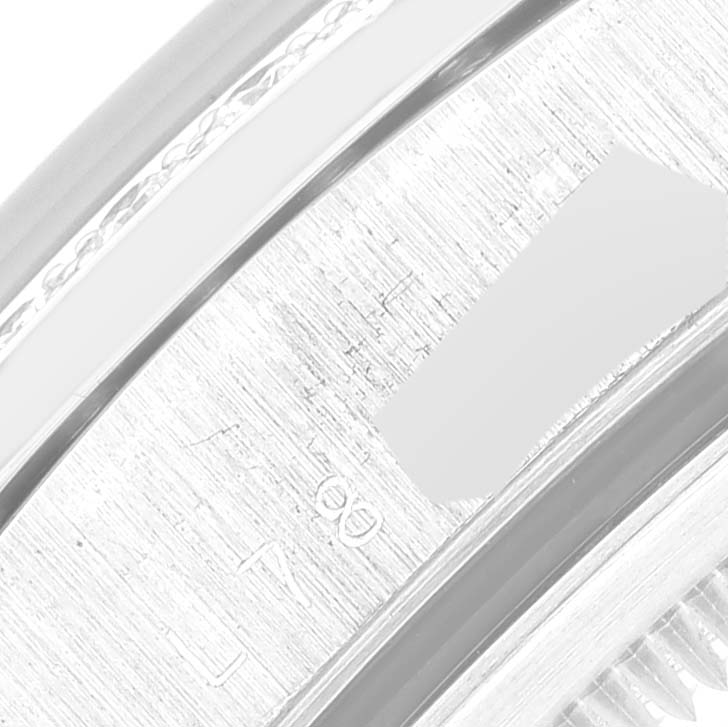 This image shows a close-up angle of the back of the Rolex President 18346 Men's Platinum Blue Dial 18346 Men's Platinum Blue Dial model watch, focusing on the details on the inner bezel.