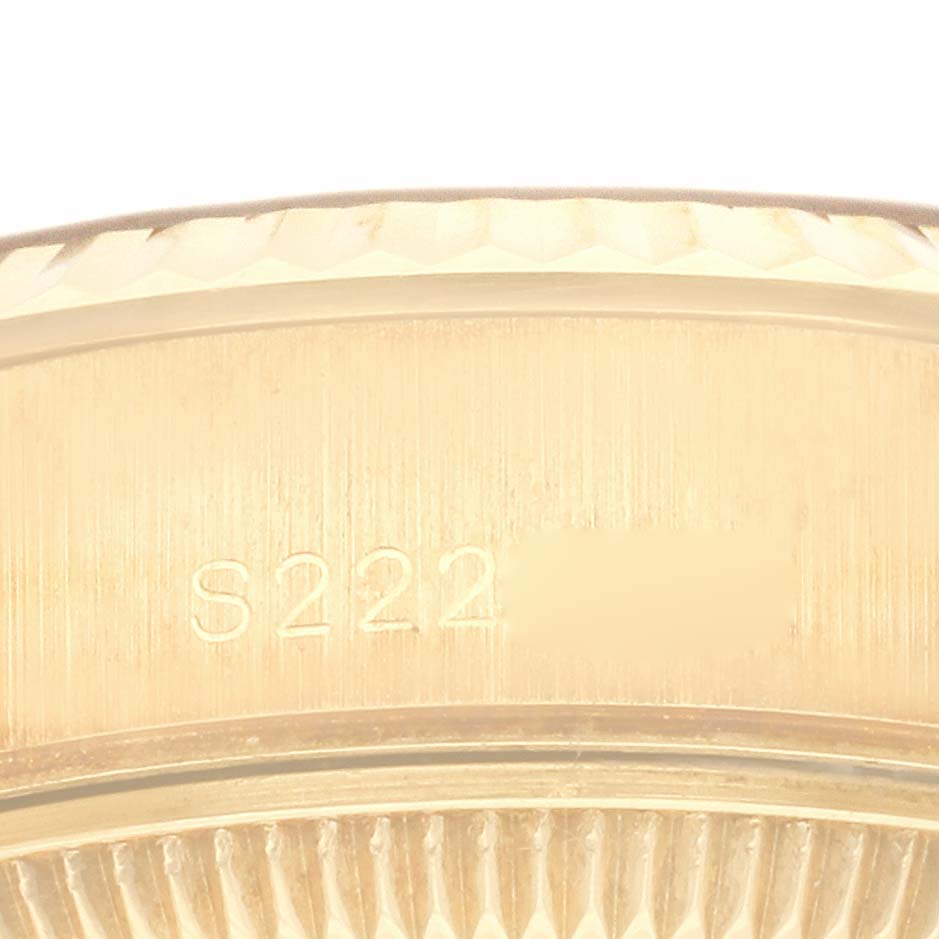 The image shows a close-up of the bezel edge of a Rolex President 69178 Women's Yellow Gold Black Dial 69178 Women's Yellow Gold Black Dial watch, highlighting the engraving "S222".