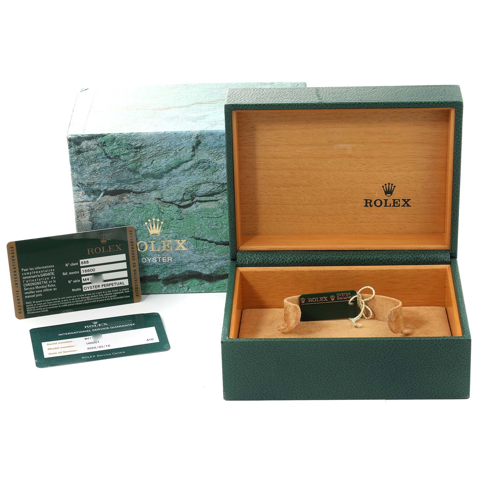 This image shows the packaging and accessories for a Rolex Sea-Dweller 16600T Men's Stainless Steel Black Dial 16600T Men's Stainless Steel Black Dial, including the green box, warranty card, and certification.