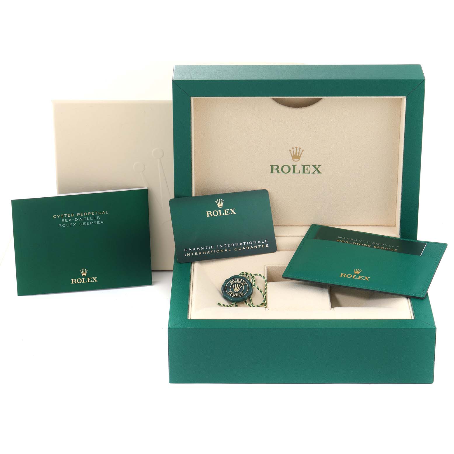 The image shows the packaging, warranty cards, and accessories for a Rolex Sea-Dweller 126660 Men
s Stainless Steel Blue Dial 126660 Men
s Stainless Steel Blue Dial watch.