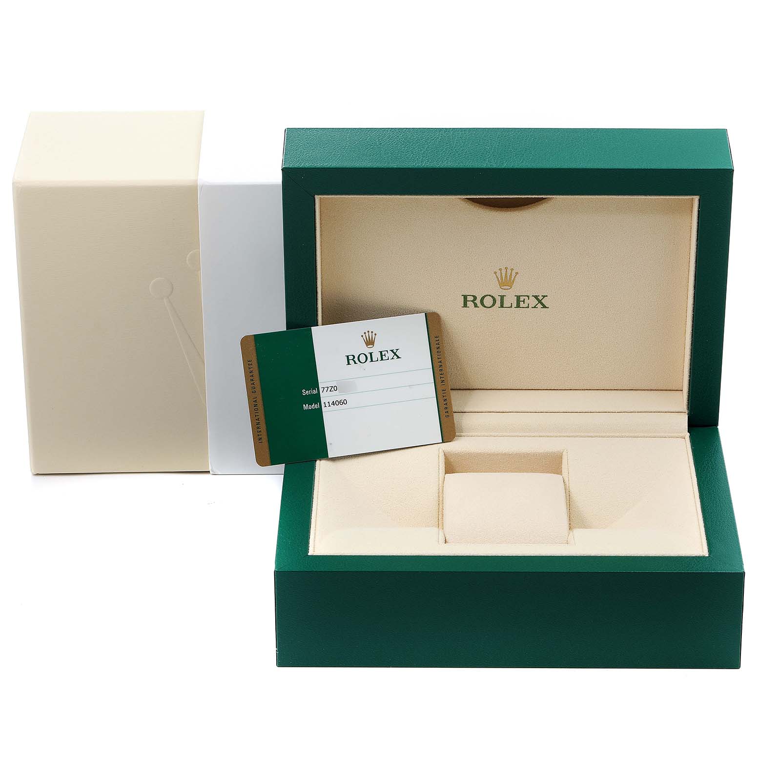 This image shows the packaging and guarantee card for the Rolex Submariner 114060 Men's Stainless Steel Black Dial 114060 Men's Stainless Steel Black Dial model, featuring a green box and an empty cushion.