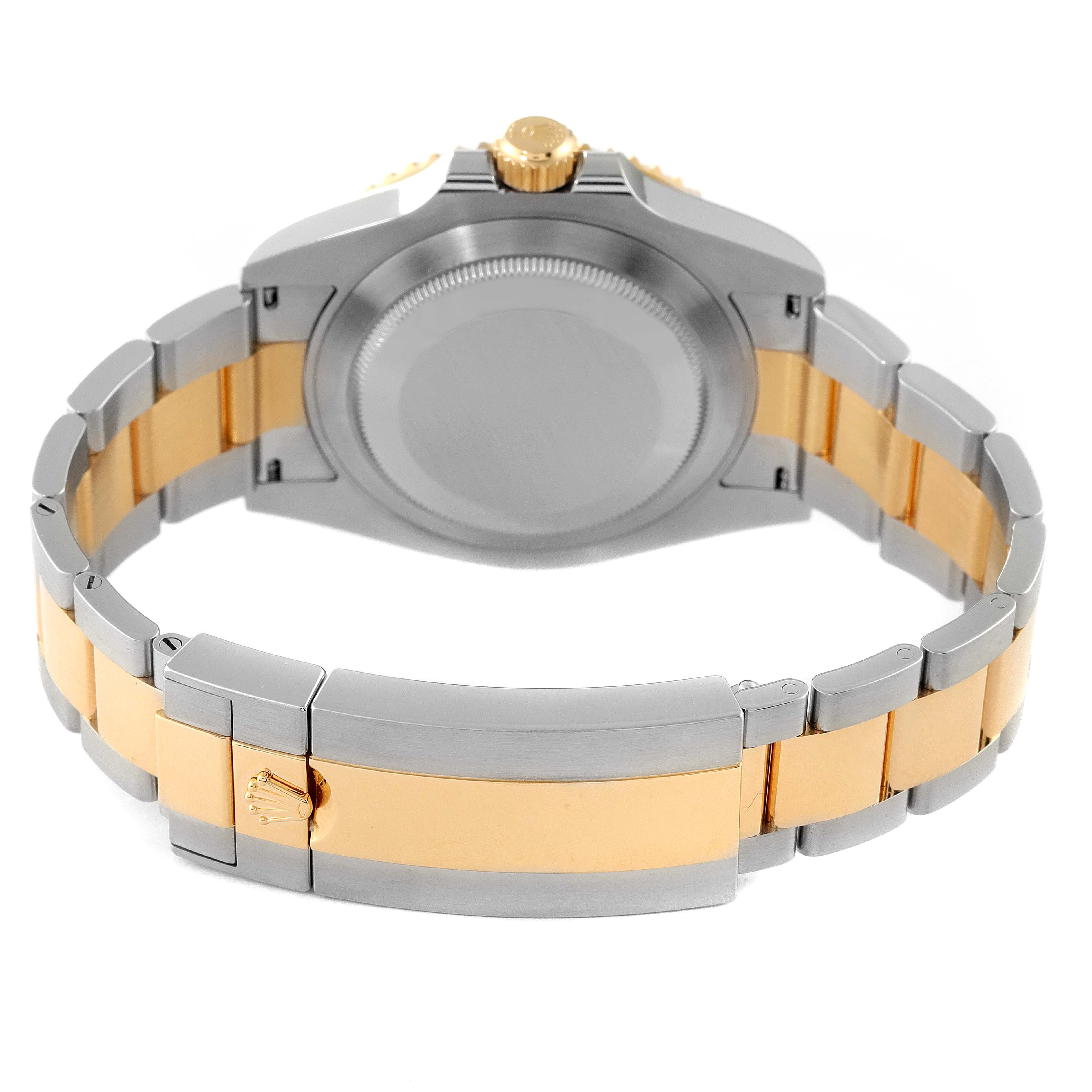 This image shows the back view of a Rolex Submariner 126613 Men
s Steel and Gold (two tone) Blue Dial 126613 Men
s Steel and Gold (two tone) Blue Dial watch, highlighting the case back and two-tone bracelet.