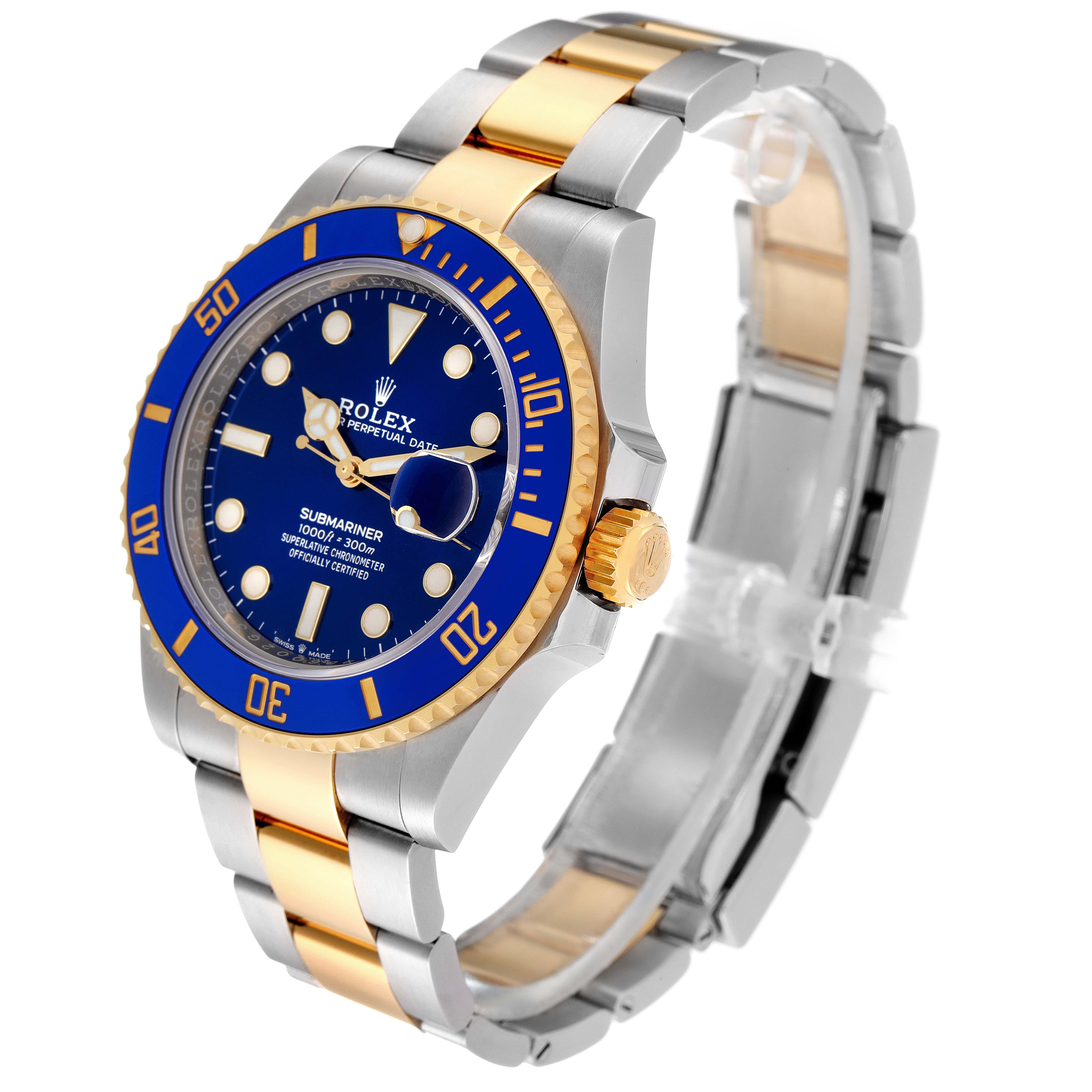 This image shows a Rolex Submariner 126613 Men
s Steel and Gold (two tone) Blue Dial 126613 Men
s Steel and Gold (two tone) Blue Dial watch at an angled view, highlighting the blue dial, two-tone bracelet, and gold bezel.