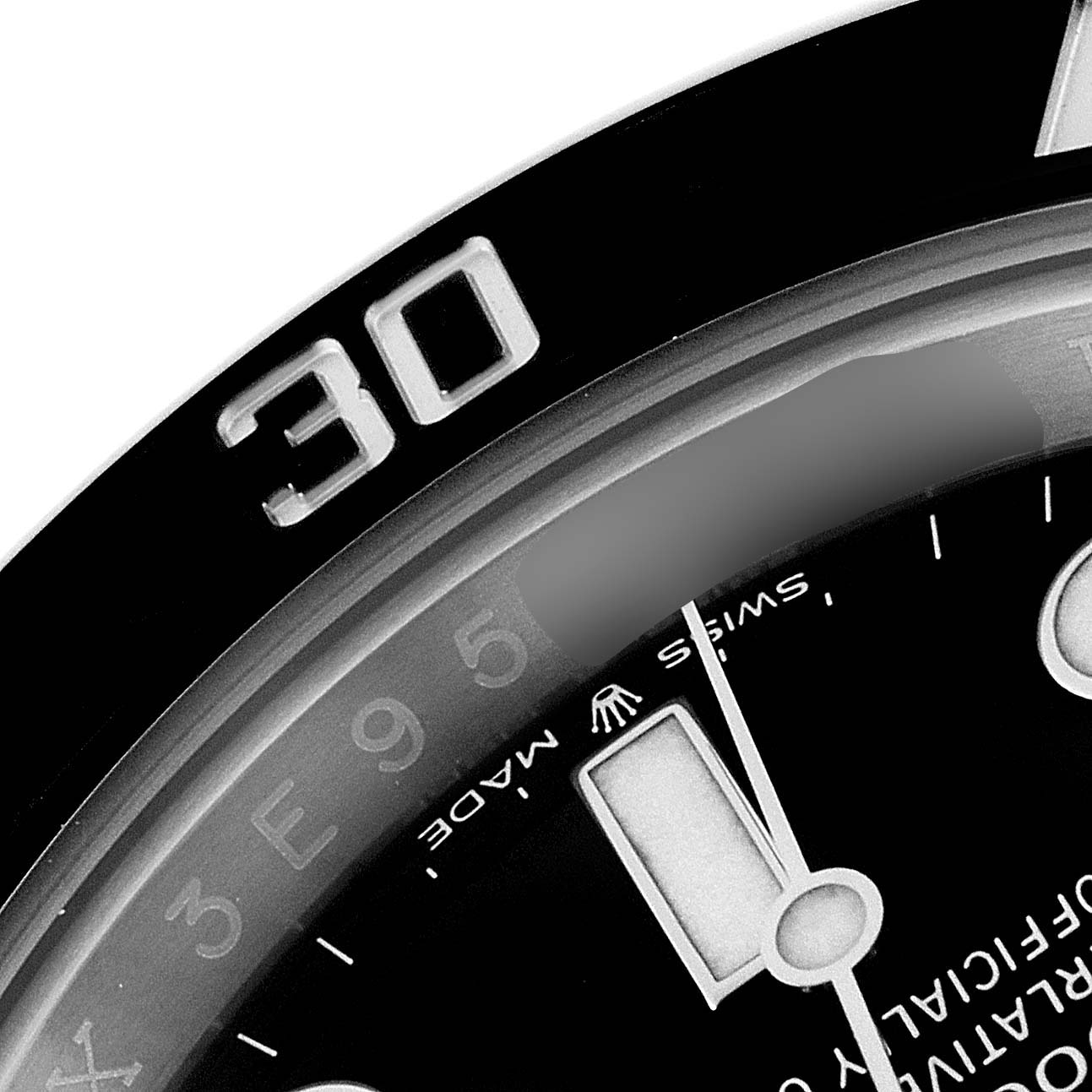 This image shows a close-up of the bezel and dial of a Rolex Submariner 124060 Men's Stainless Steel Black Dial 124060 Men's Stainless Steel Black Dial watch, highlighting the "30" minute mark and part of the hour marker.