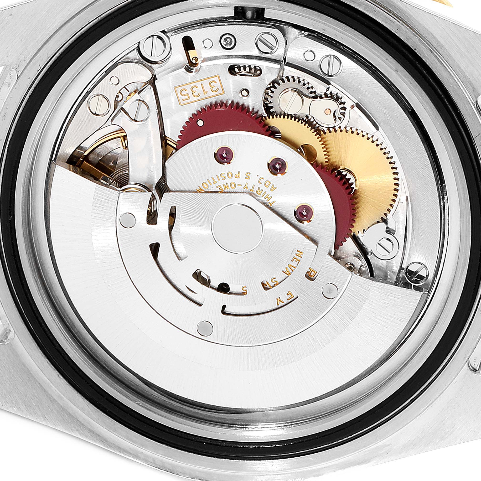 This image shows the inner mechanical movement components of a Rolex Submariner 16613 Men's Steel and Gold (two tone) Blue Dial 16613 Men's Steel and Gold (two tone) Blue Dial watch from a rear angle.