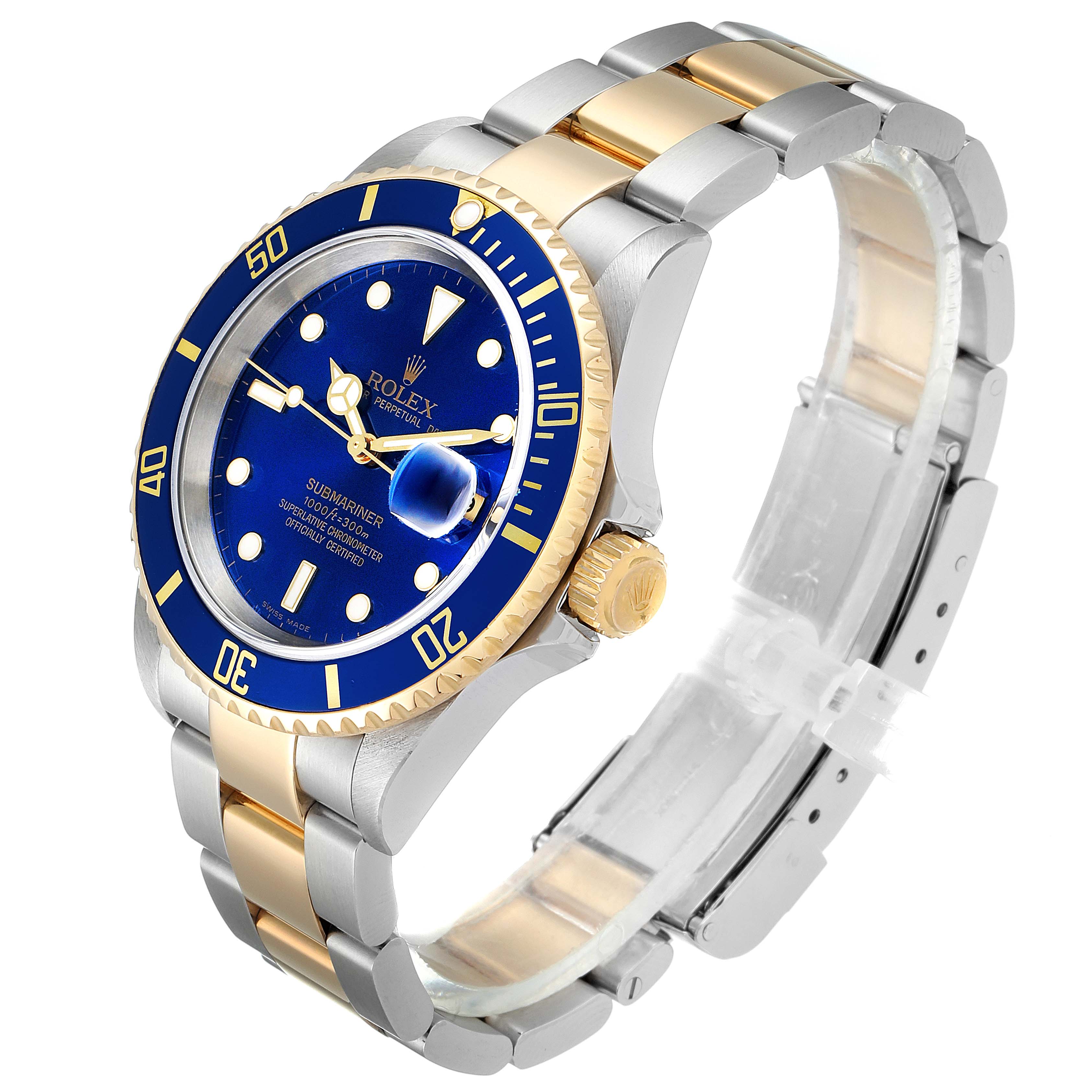 The image shows a Rolex Submariner 16613 Men's Steel and Gold (two tone) Blue Dial 16613 Men's Steel and Gold (two tone) Blue Dial watch at a three-quarter angle, highlighting the face, bezel, and bracelet.