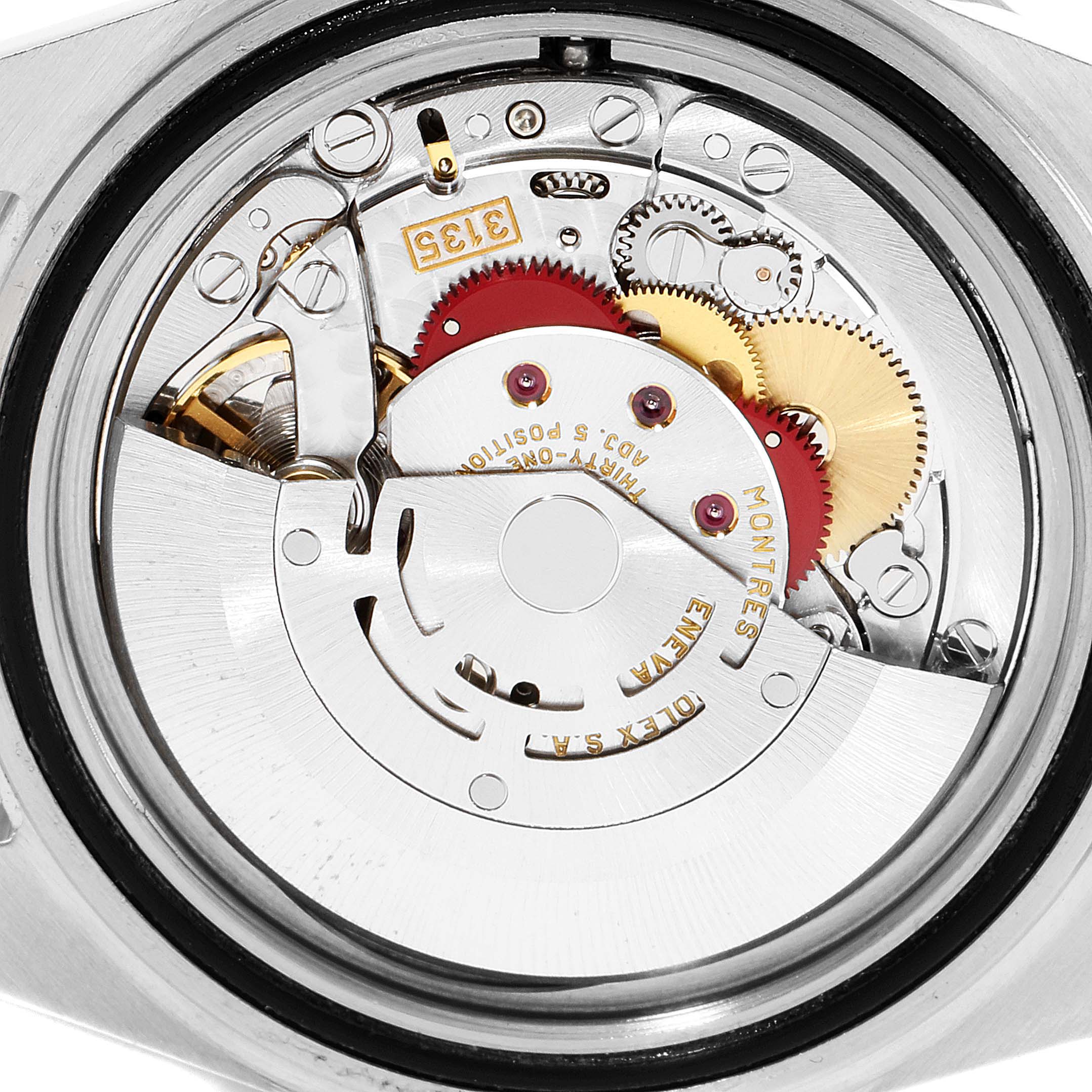 The image shows the internal mechanical movement and components of a Rolex Submariner 16613 Men's Steel and Gold (two tone) Grey Dial 16613 Men's Steel and Gold (two tone) Grey Dial watch from a back angle.