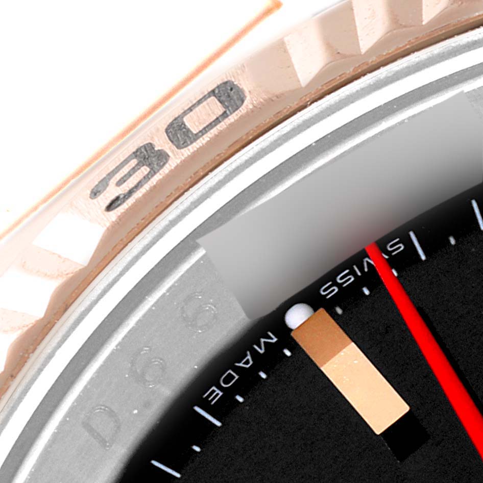 The image shows a close-up of the bezel, dial, and second hand of the Rolex Turn-o-Graph 116261 Men
s Steel and Gold (two tone) Black Dial 116261 Men
s Steel and Gold (two tone) Black Dial watch.