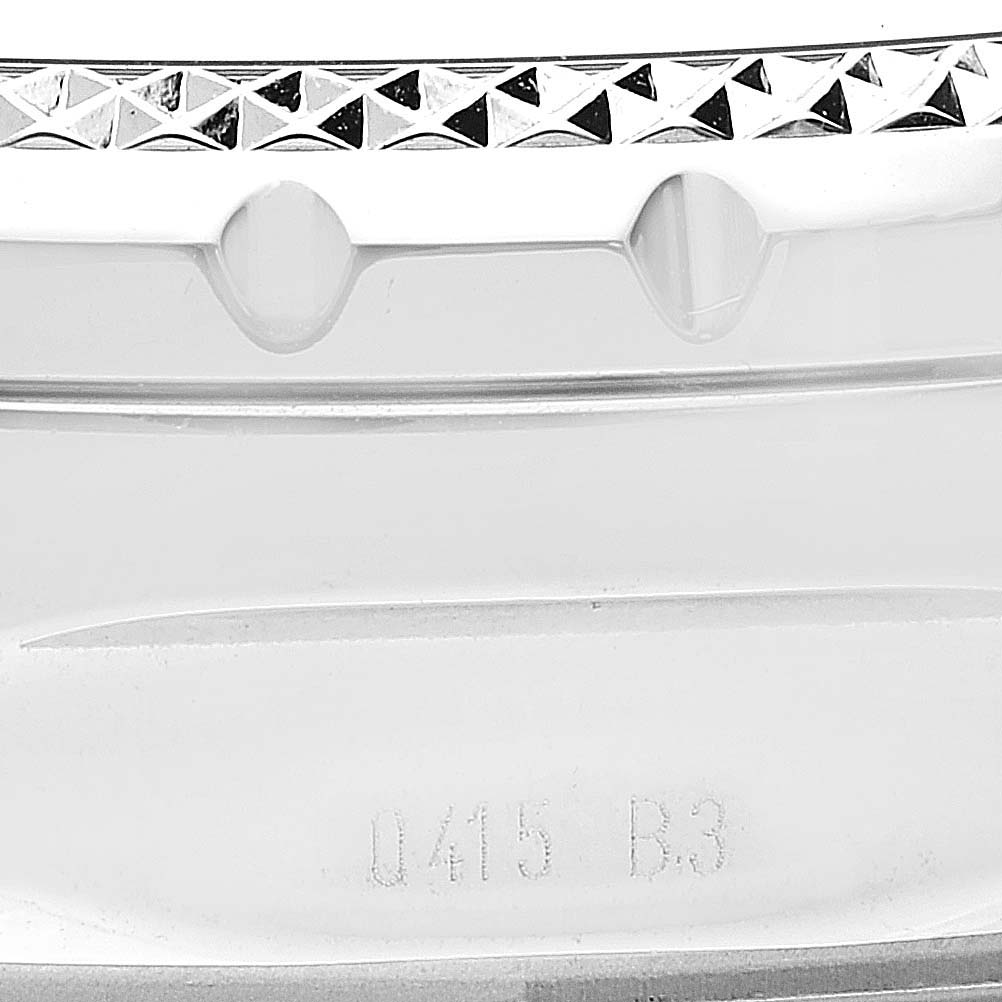 This image displays a close-up of the bezel and part of the crown on the Breitling Bentley A13362 Men's Stainless Steel White Dial A13362 Men's Stainless Steel White Dial watch, with a reference number etched below.