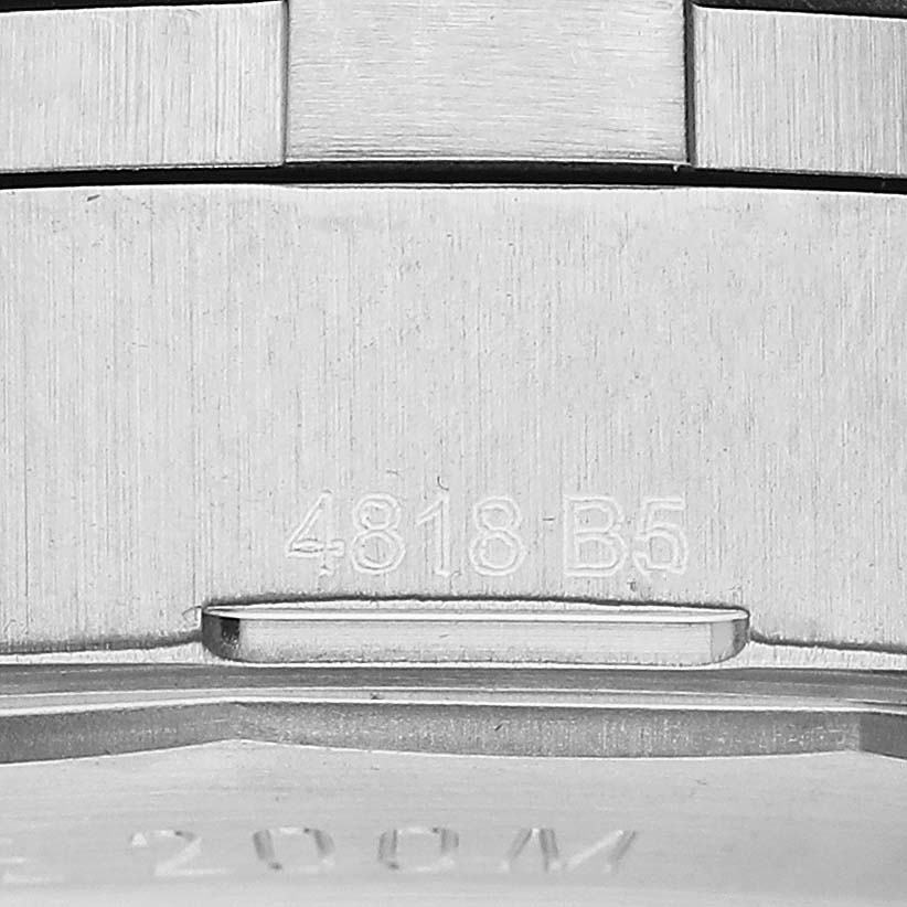 This image shows a close-up of the back case and part of the bracelet of the Breitling Colt A17388 Men's Stainless Steel Blue Dial A17388 Men's Stainless Steel Blue Dial watch, with model number engraving visible.