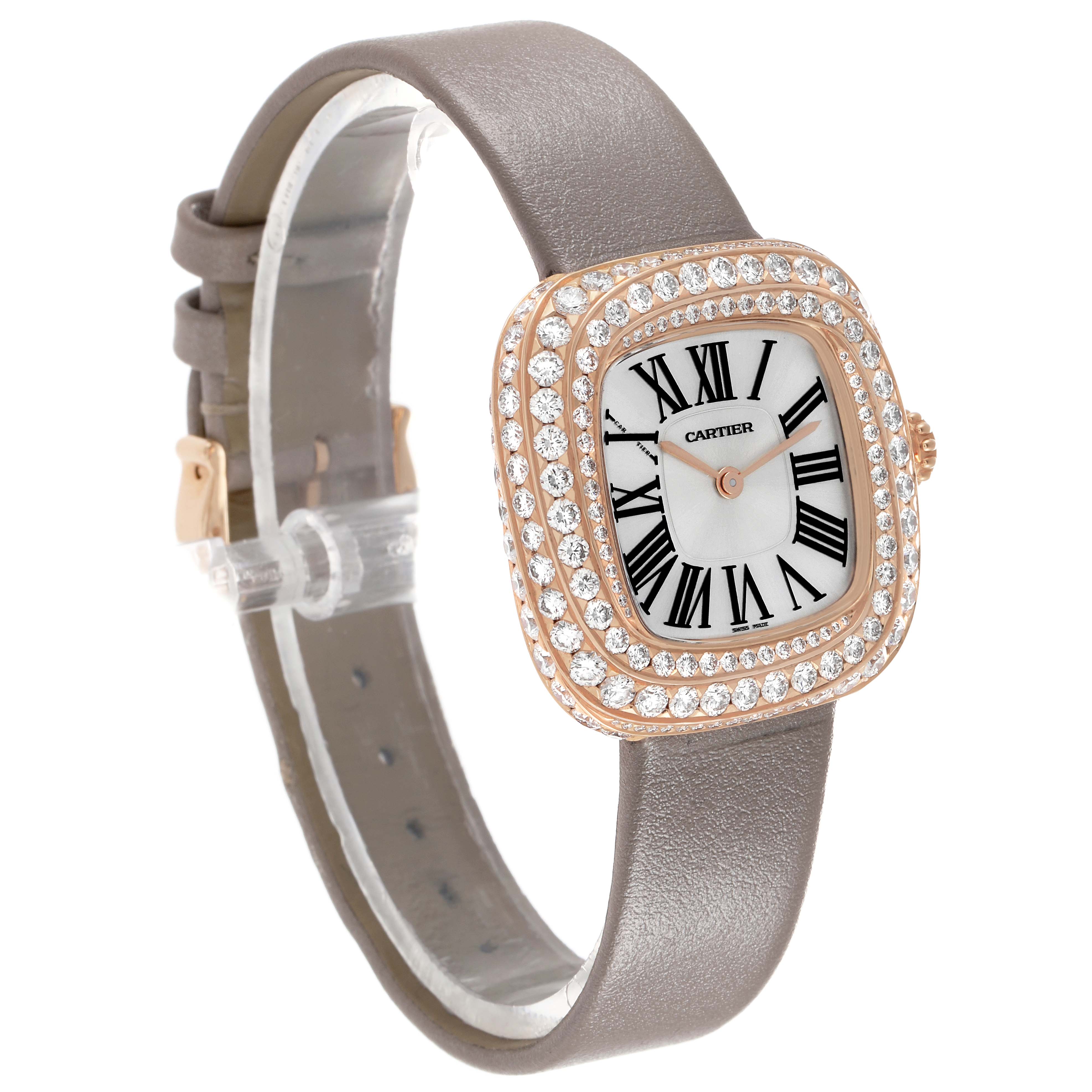 The Cartier Coussin WJCS0005 Women's Rose Gold Silver Dial watch is shown at a three-quarter angle, highlighting its diamond-encrusted bezel and leather strap.