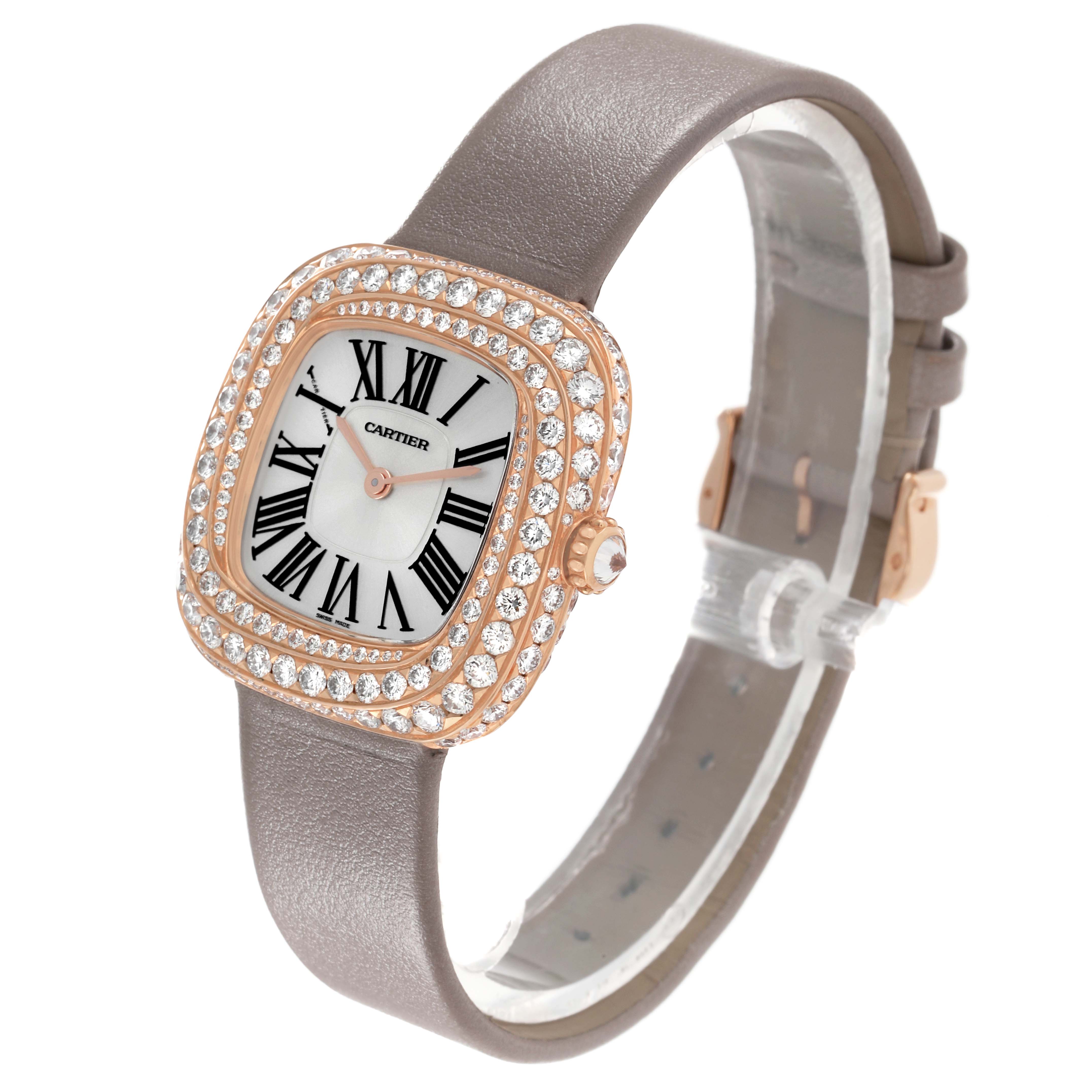The Cartier Coussin WJCS0005 Women's Rose Gold Silver Dial watch is shown at a three-quarter angle, highlighting its diamond-encrusted bezel and leather strap.