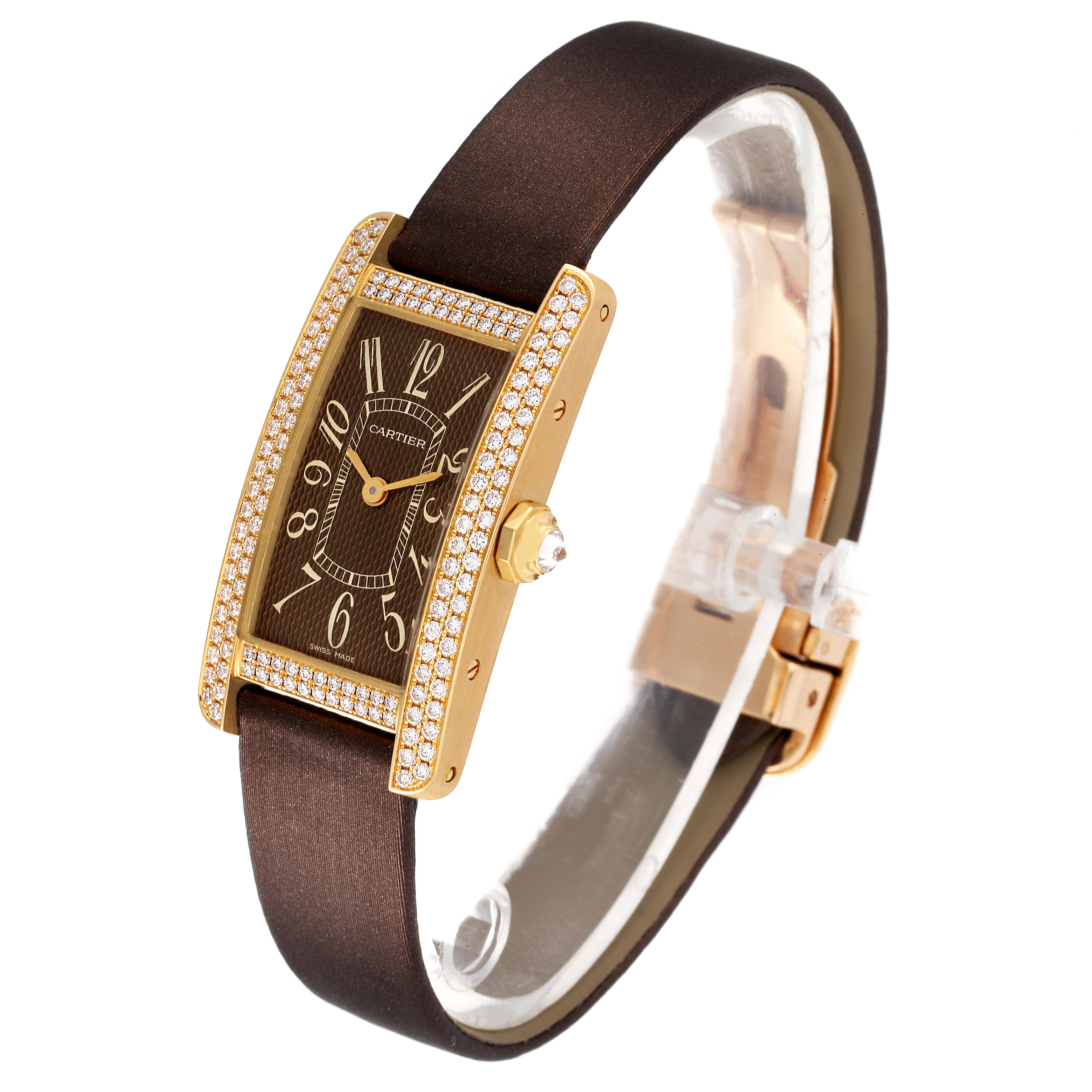 The Cartier Tank Americaine 2482 Women's Yellow Gold Brown Dial 2482 Women's Yellow Gold Brown Dial watch is shown from an angle highlighting its diamond bezel, brown dial, and leather strap.