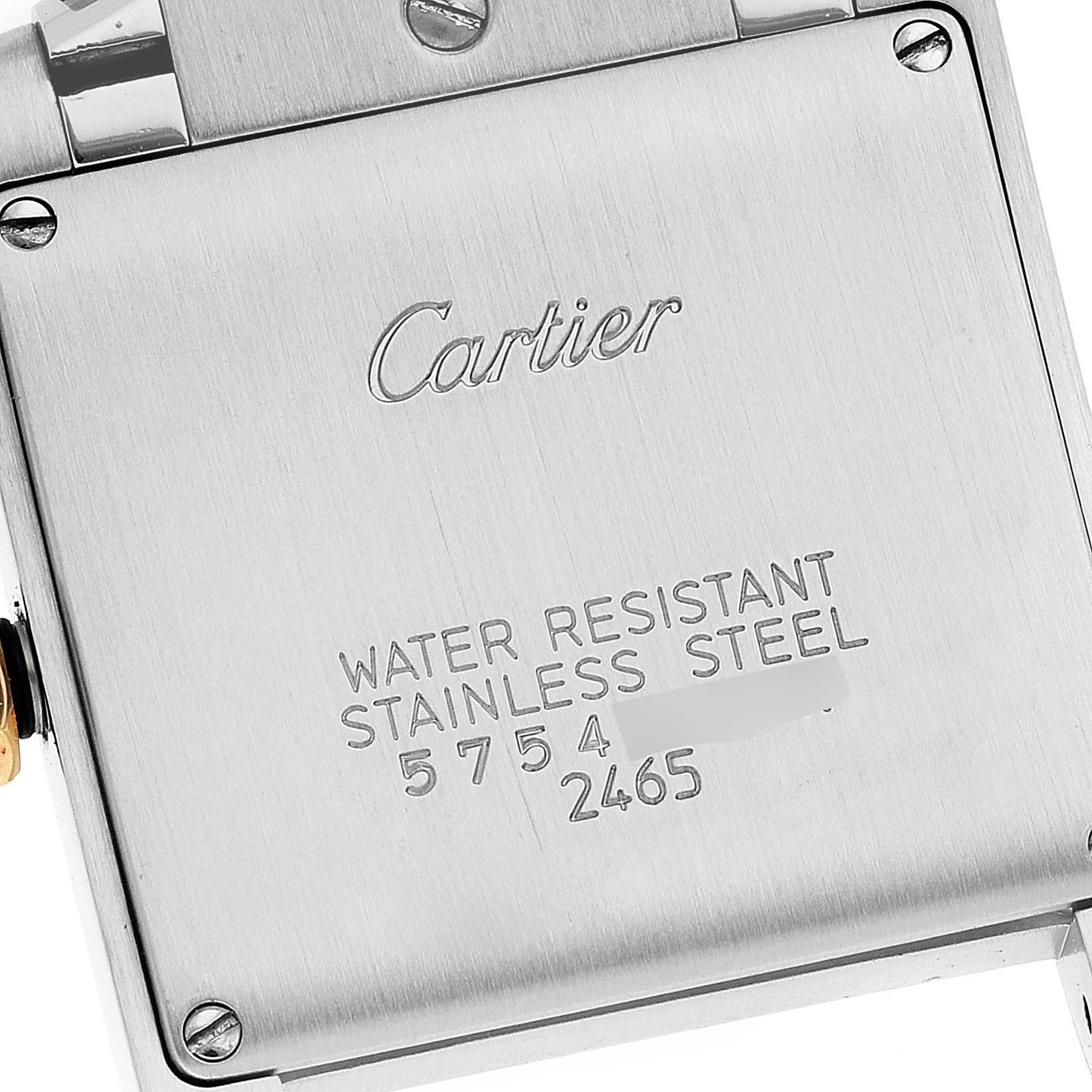 This image displays the back case of a Cartier Tank Francaise W51012Q4 Women's Steel and Gold (two tone) Silver Dial W51012Q4 Women's Steel and Gold (two tone) Silver Dial watch, showing the brand name and specifications.