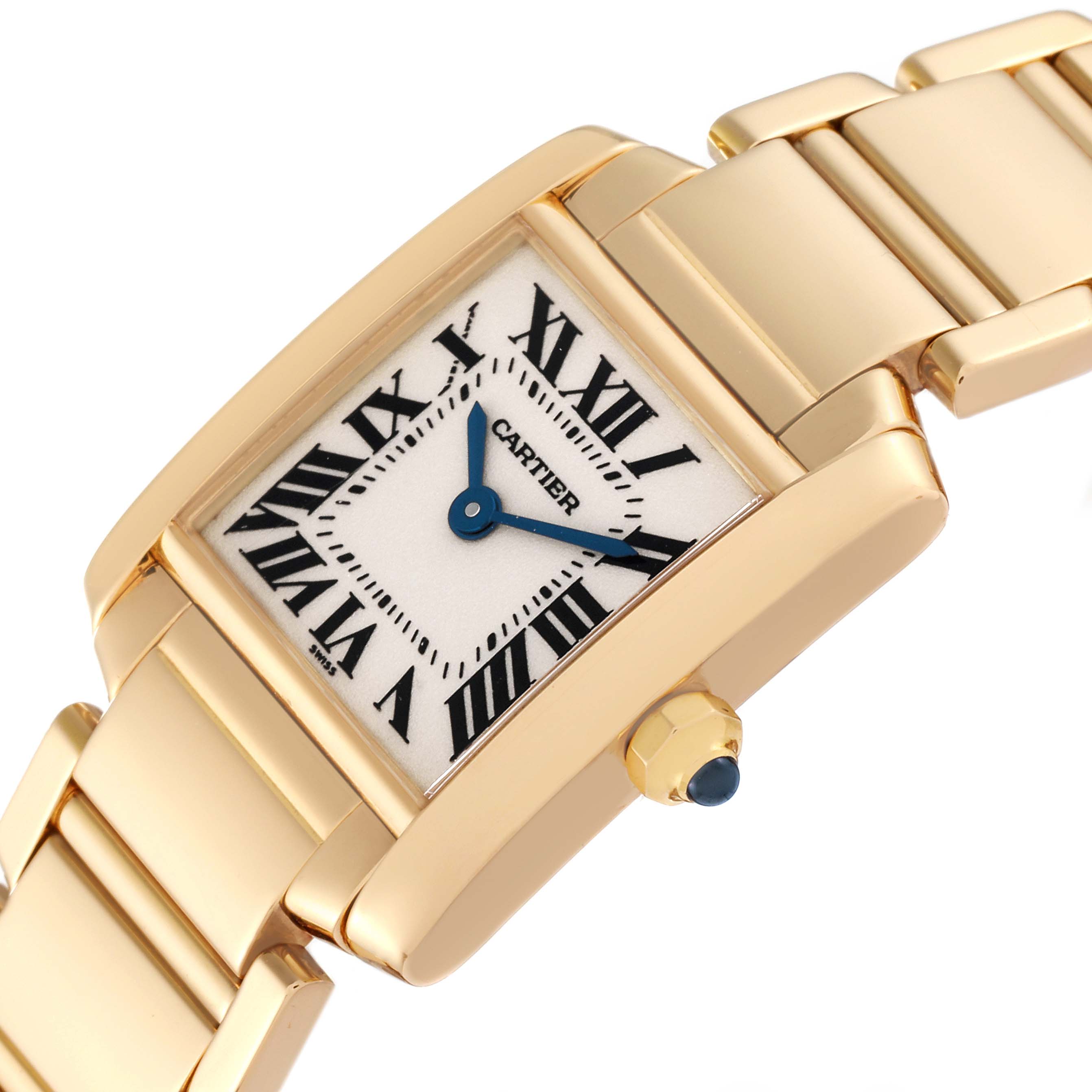 The image shows a close-up angle of a Cartier Tank Francaise W50002N2 Women
s Yellow Gold Silver Dial W50002N2 Women
s Yellow Gold Silver Dial watch, highlighting the face, crown, and part of the bracelet.