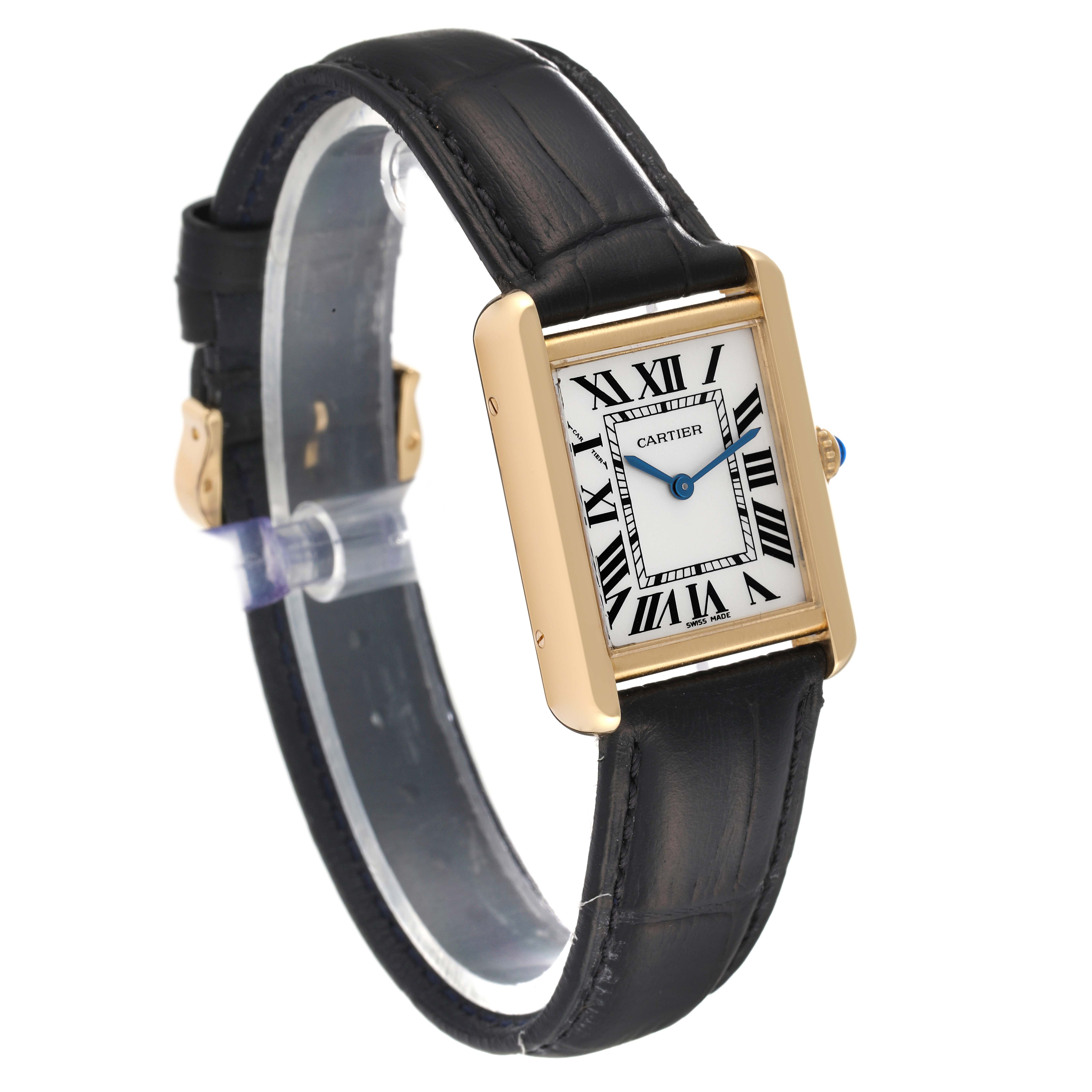 The Cartier Tank Solo W1018755 Women
s Steel and Gold (two tone) Silver Dial W1018755 Women
s Steel and Gold (two tone) Silver Dial watch is shown at an angle displaying its face, black leather strap, and gold-tone case.