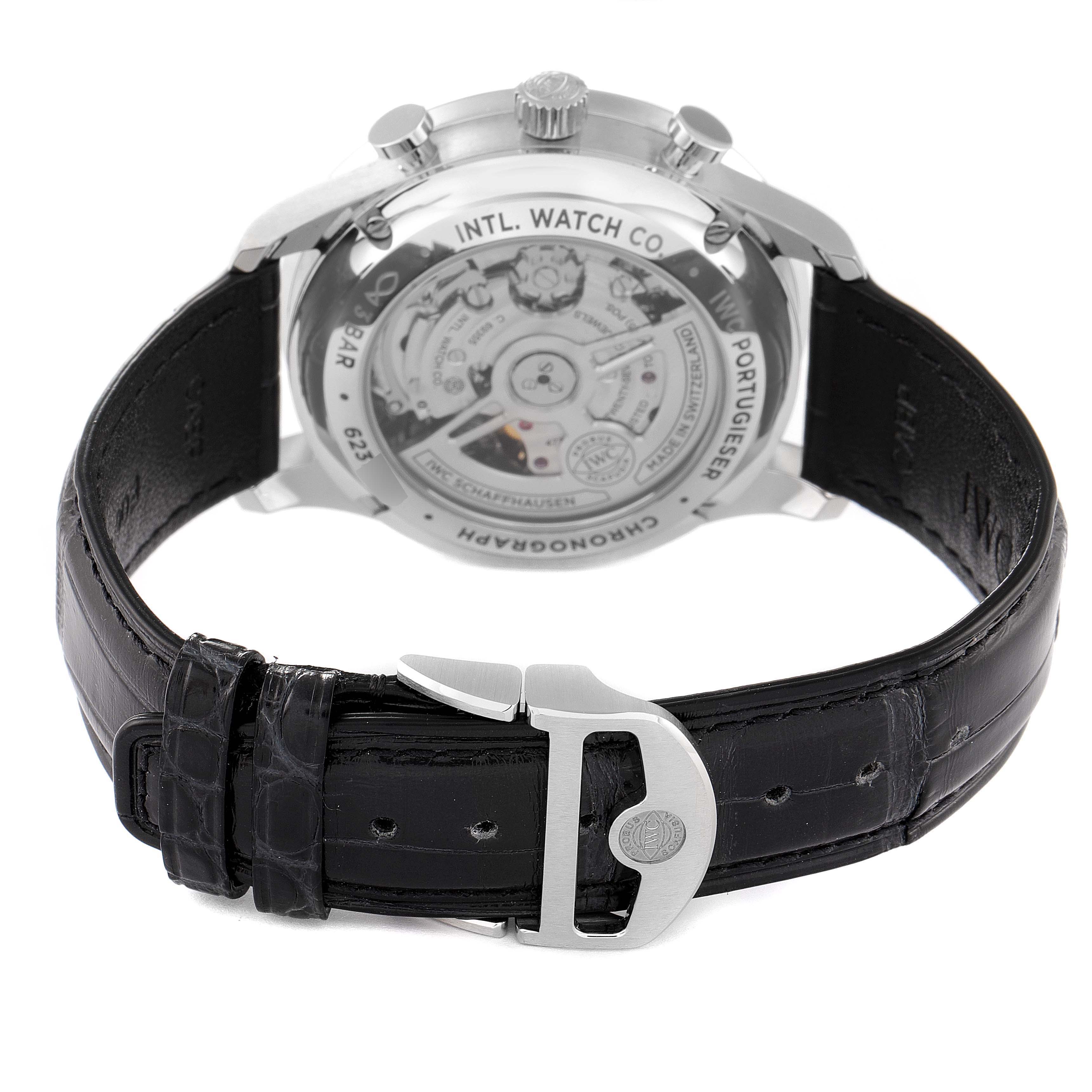 This image shows the back view of the IWC Portuguese IW371615 Men's Stainless Steel Green Dial IW371615 Men's Stainless Steel Green Dial model watch, highlighting its movement and black leather strap.